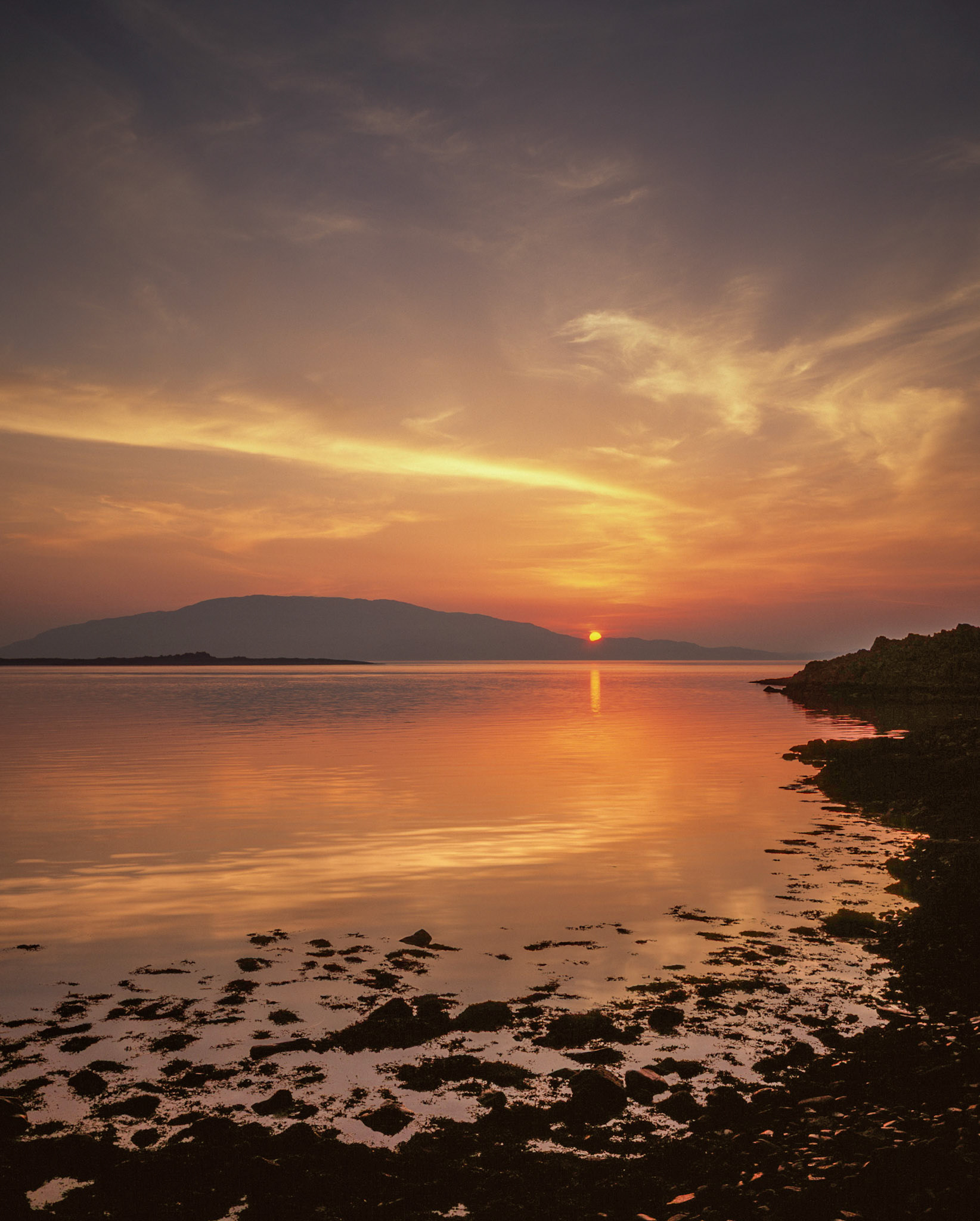 Beautiful summer sunset from the seashore at Craignish