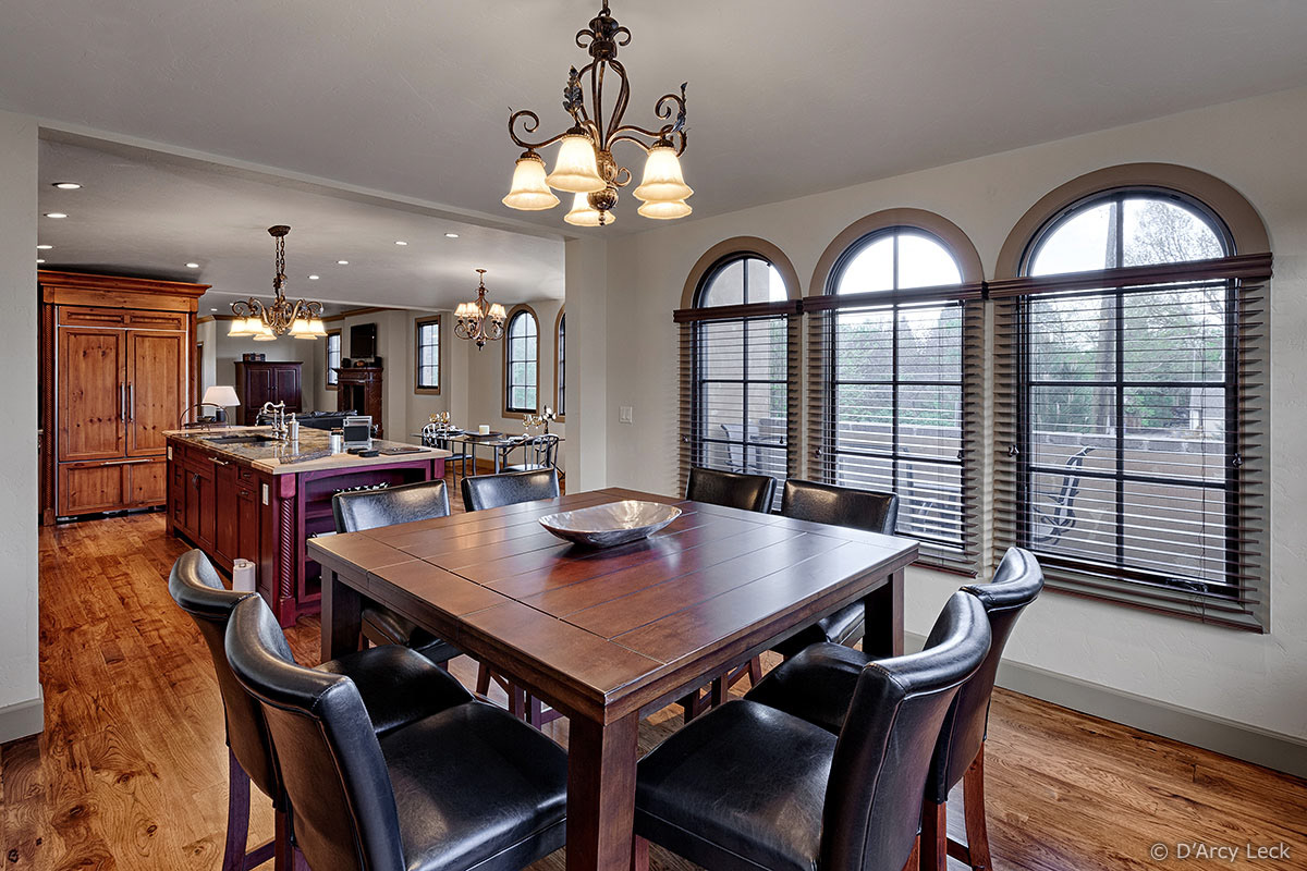 architectural interior photographer D'Arcy Leck captures a dining room and kitchen of luxury townhouse