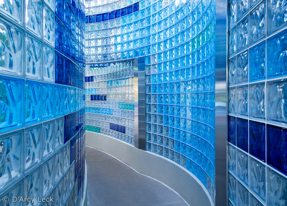 architectural photography of the interior of colored glass block pool house