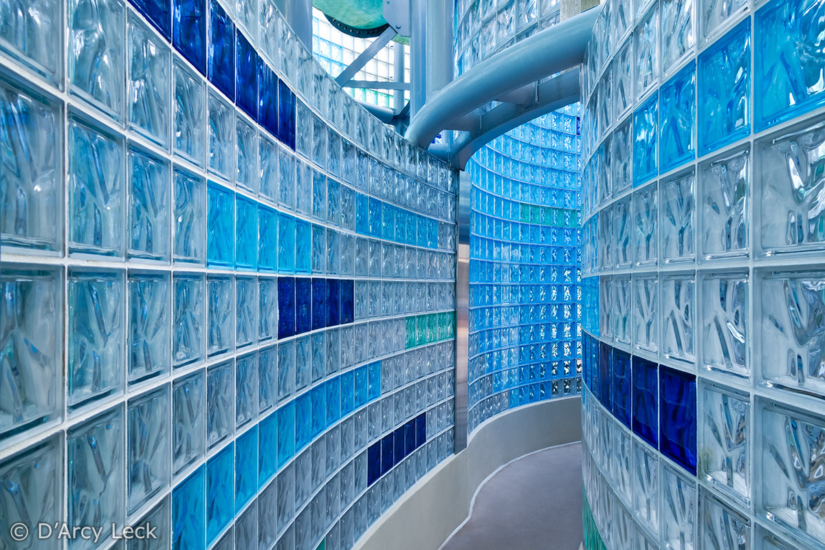 architectural photographer D'Arcy Leck photographs the interior of colored glass block pool house