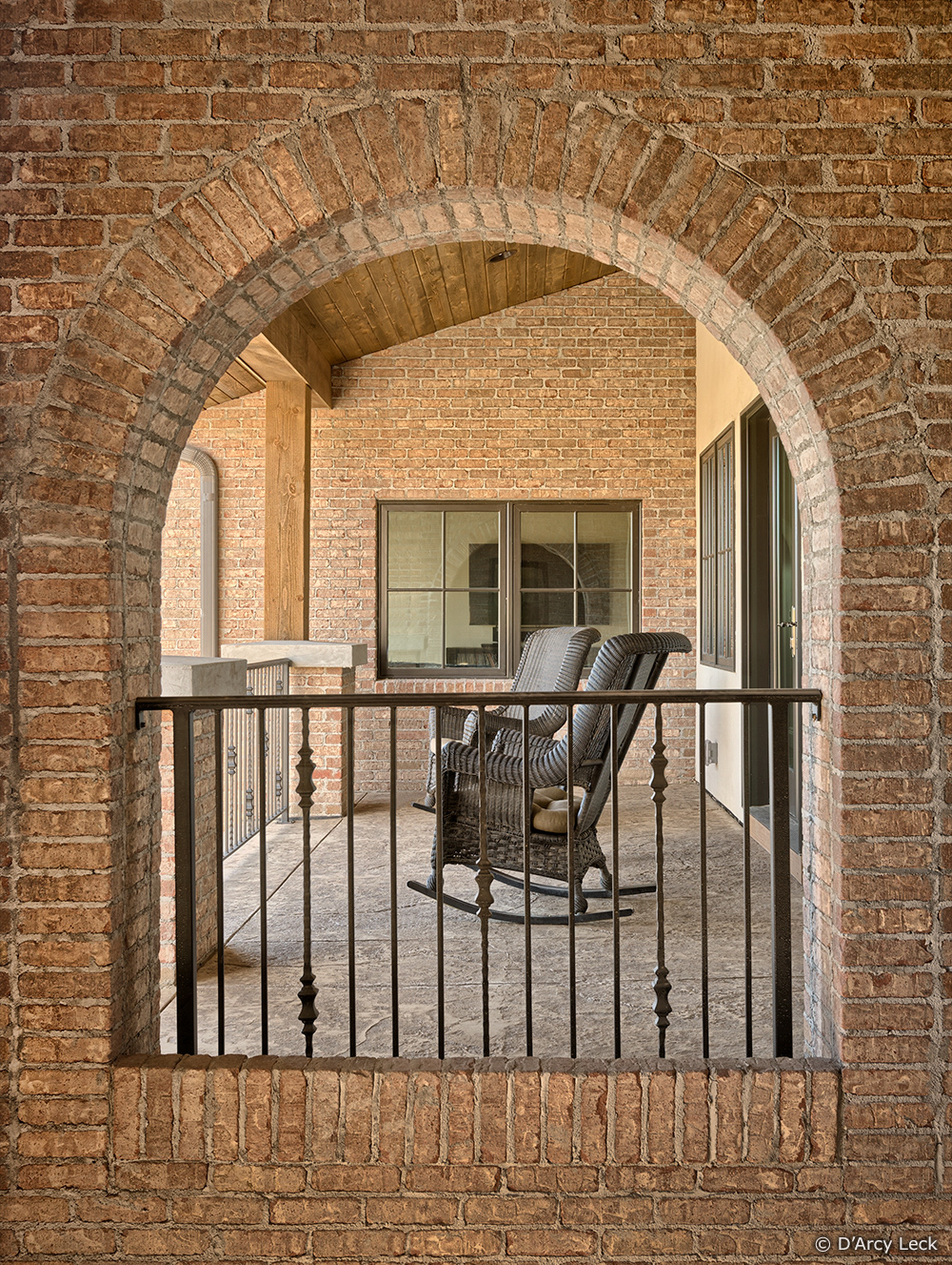 architectural photography of the upper front porch of a luxury residential home