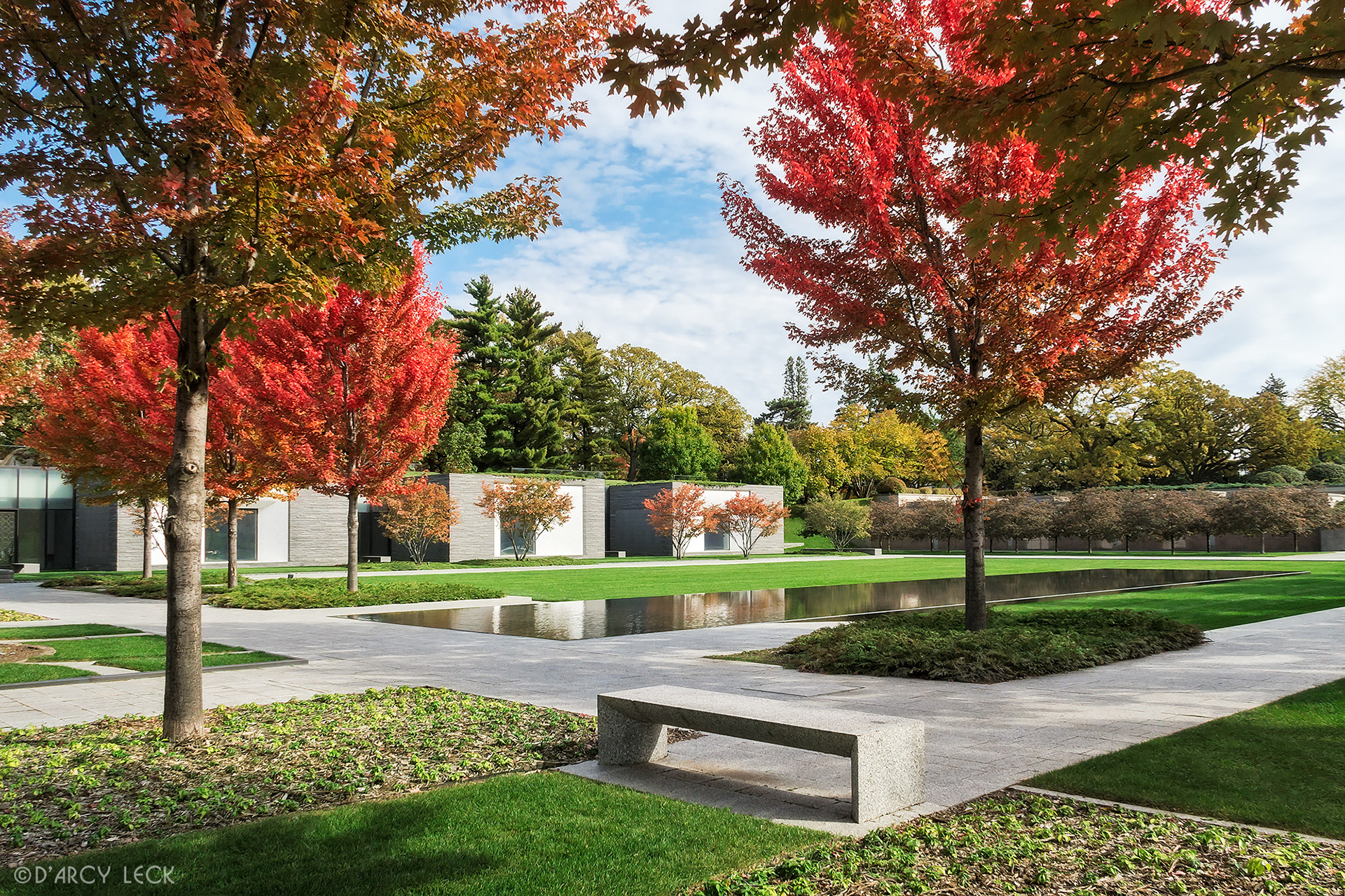 landscape architecture photography of courtyard with reflecting pond of the Lakewood Garden Mausoleum in autumn