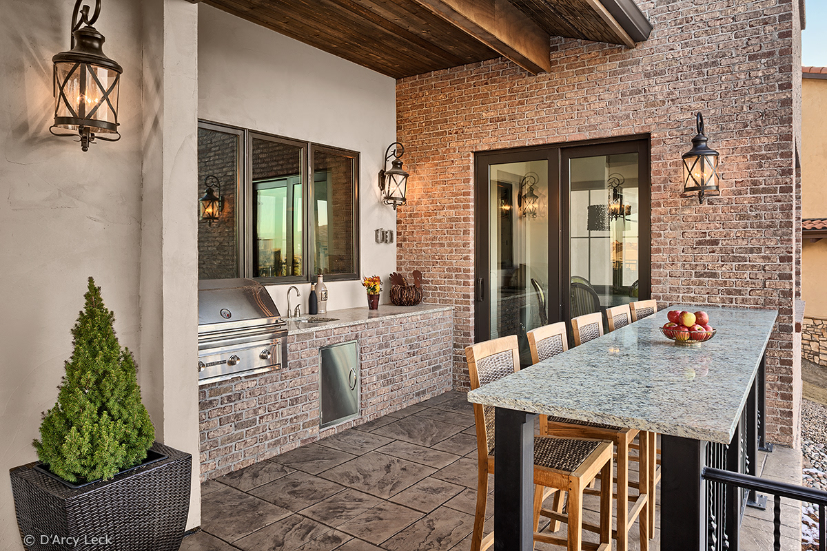 architectural photography of the rear patio/deck of a luxury residential home