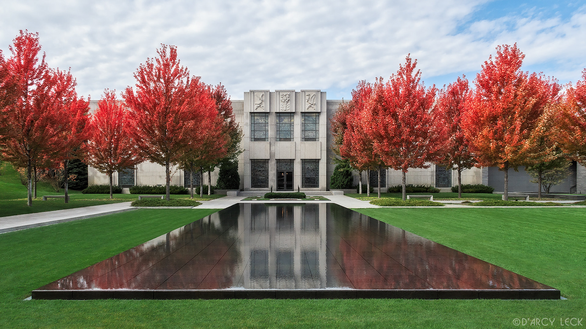 landscape architecture photographer D'Arcy Leck photographs the courtyard with autumn blaze maple trees and reflecting pond in courtyard of the Lakewood Garden Mausoleum in autumn