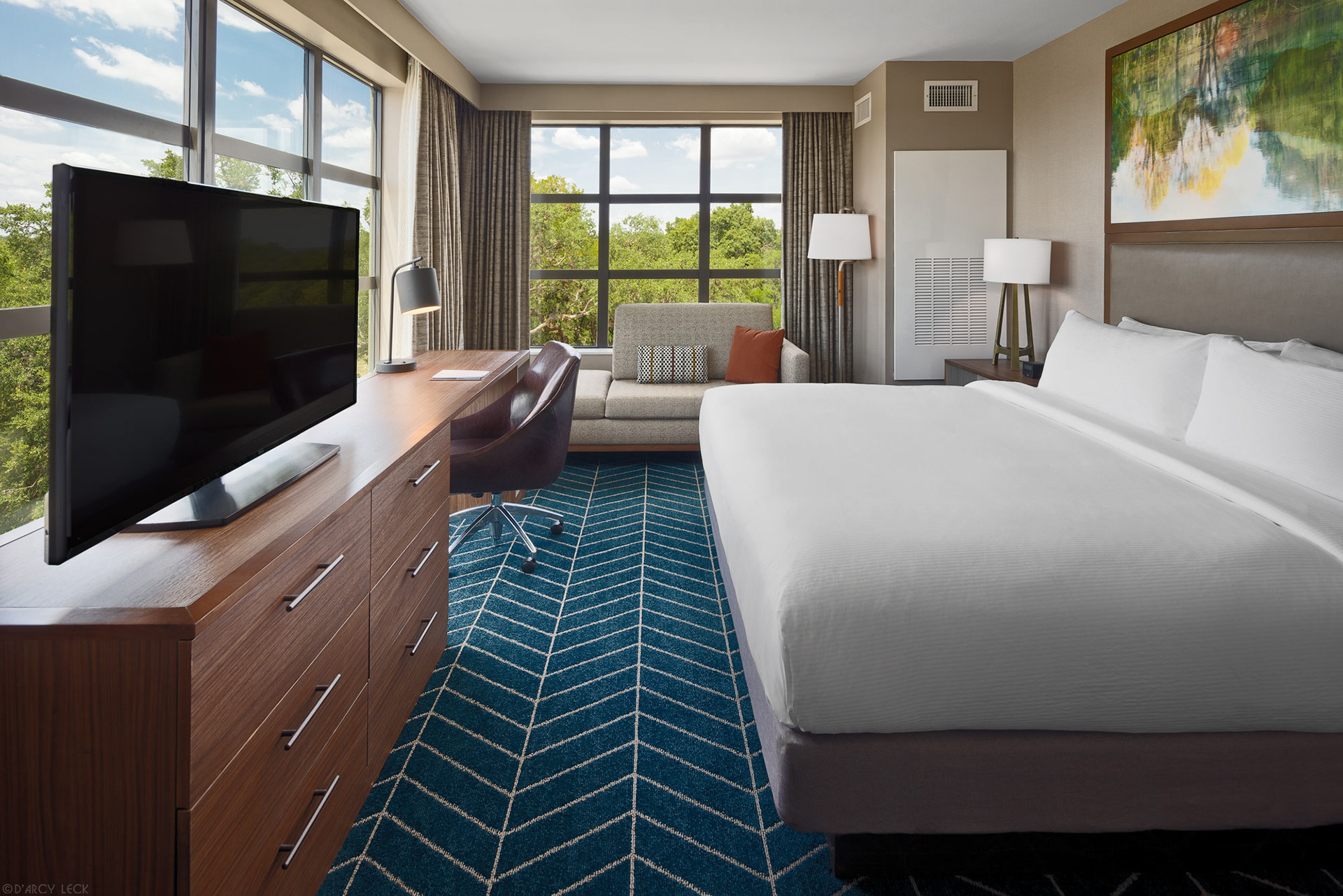Hotel photographer D'Arcy Leck photographs a guest room at The Bevy Hotel