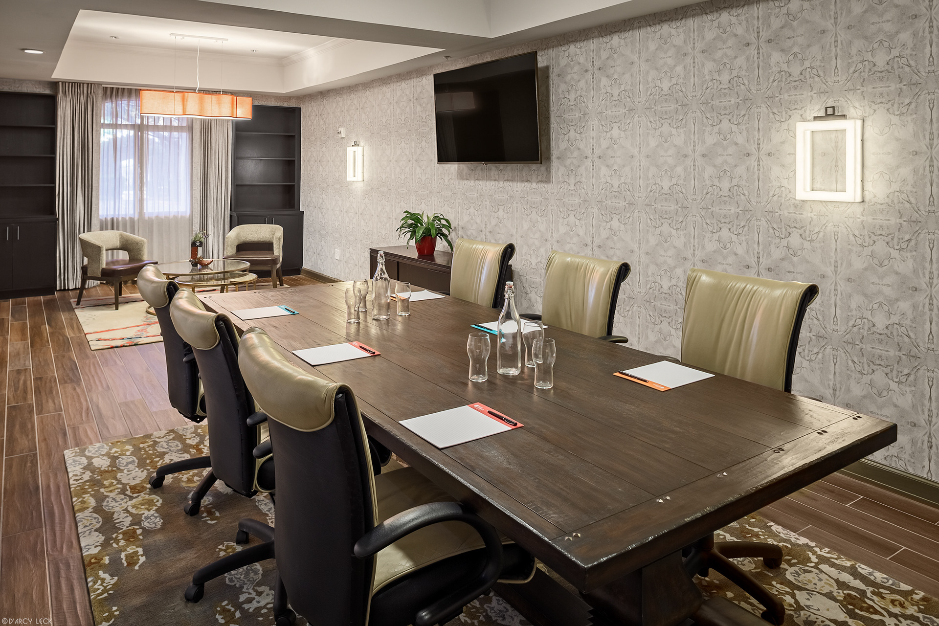Hotel photographer D'Arcy Leck photographs a boardroom meeting space of the Hotel Indigo San Antonio Riverwalk