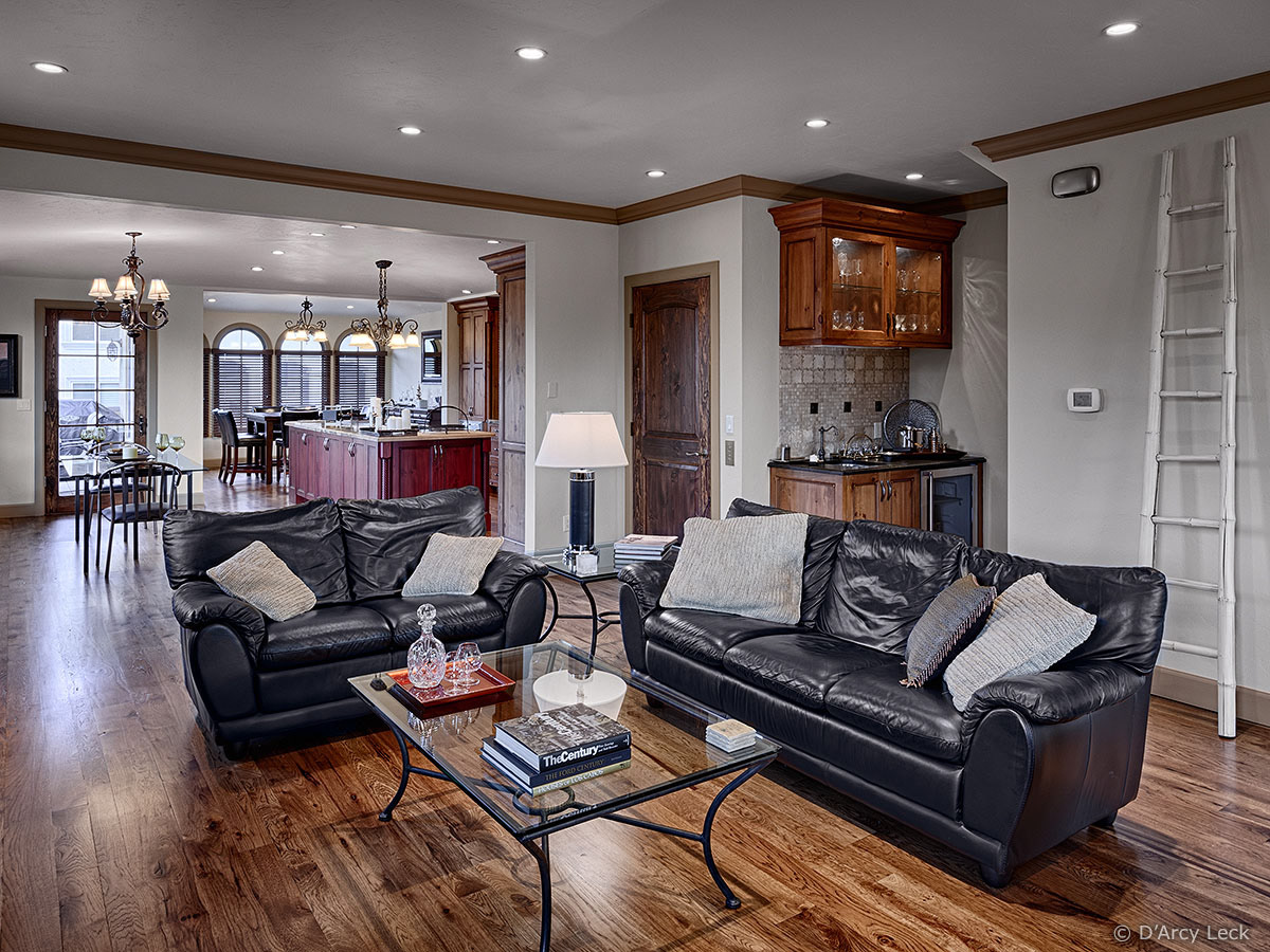 interior photographer D'Arcy Leck photographs the main floor living room, kitchen, and dining room of luxury townhouse 