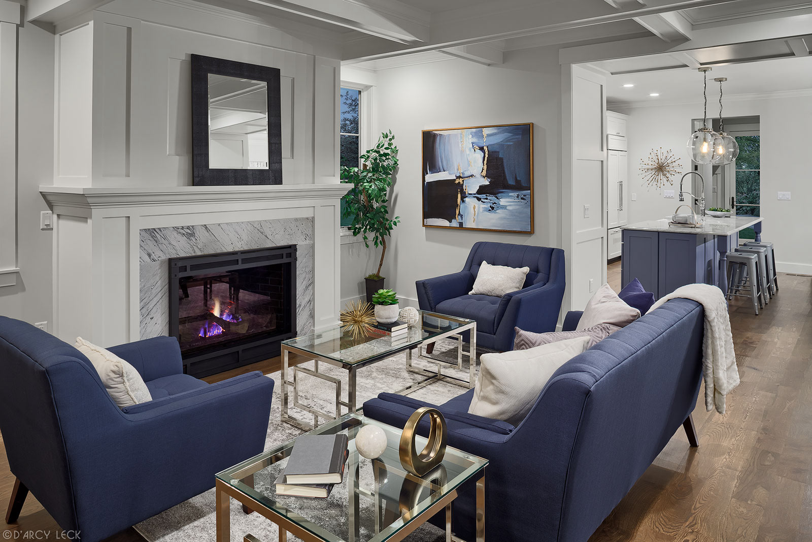 architectural interior photographer D'Arcy Leck captures a living room and kitchen of a modern duplex for MmD Architecture Studio