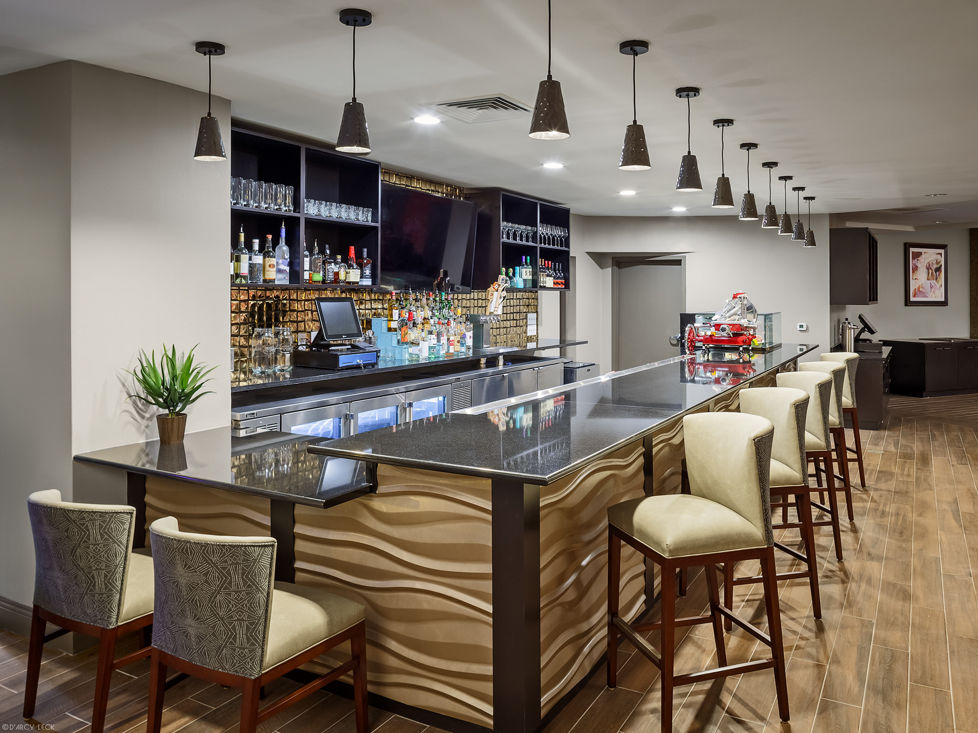 Hospitality photographer D'Arcy Leck photographs the bar of the Hotel Indigo San Antonio Riverwalk