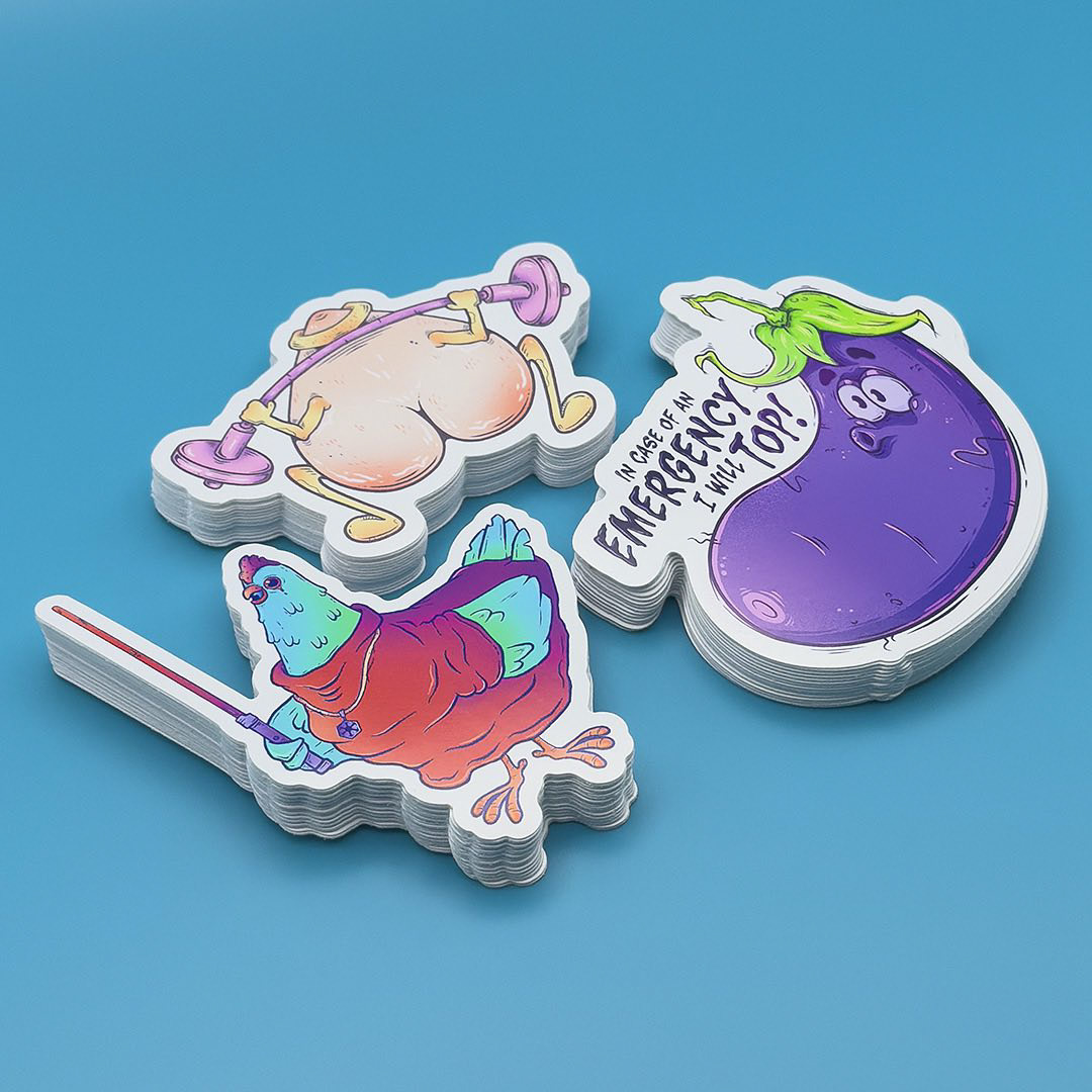 Photograph of illustrated printed stickers stacked, chicken sith, eggplant and peach doing squats
