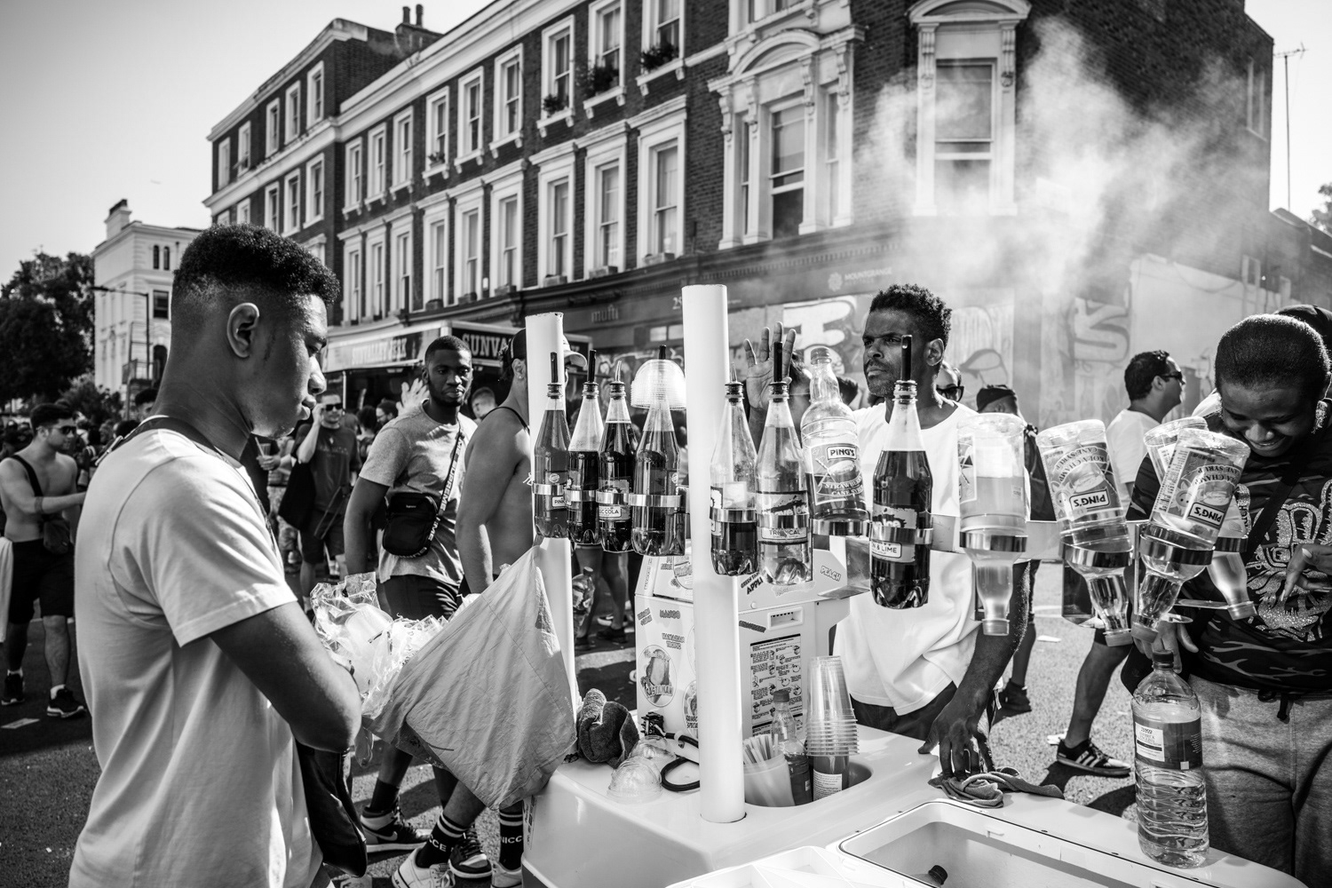 Drinks for sale on a street vendors bar. Image © Nik van Herpt