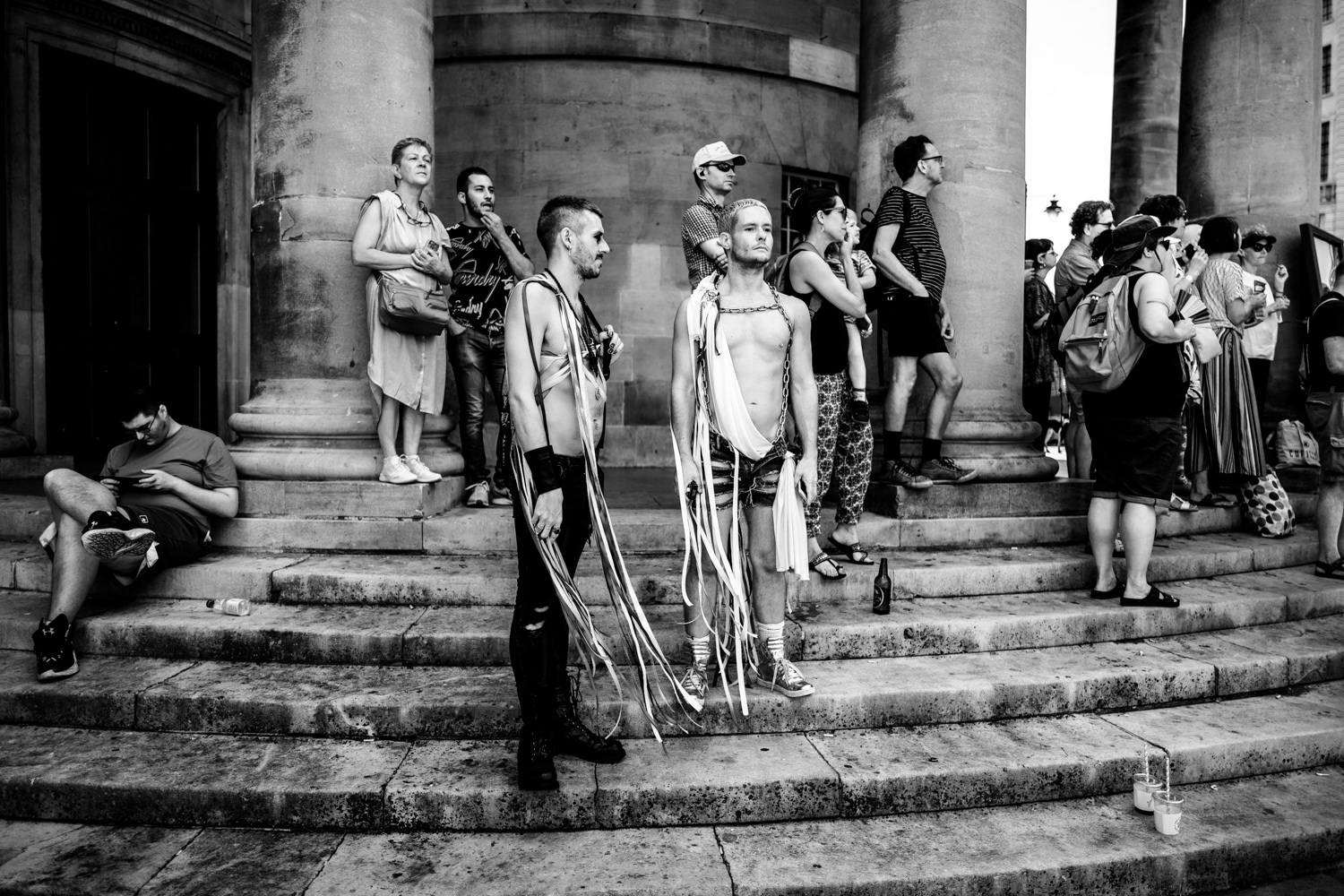 Spectators on the steps of All Souls church watching the pride parade go past. Image © Nik van Herpt