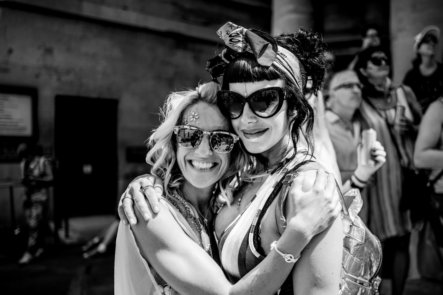 Two girls, arm in arm at All Souls church, enjoying themselves at the parade. Image © Nik van Herpt