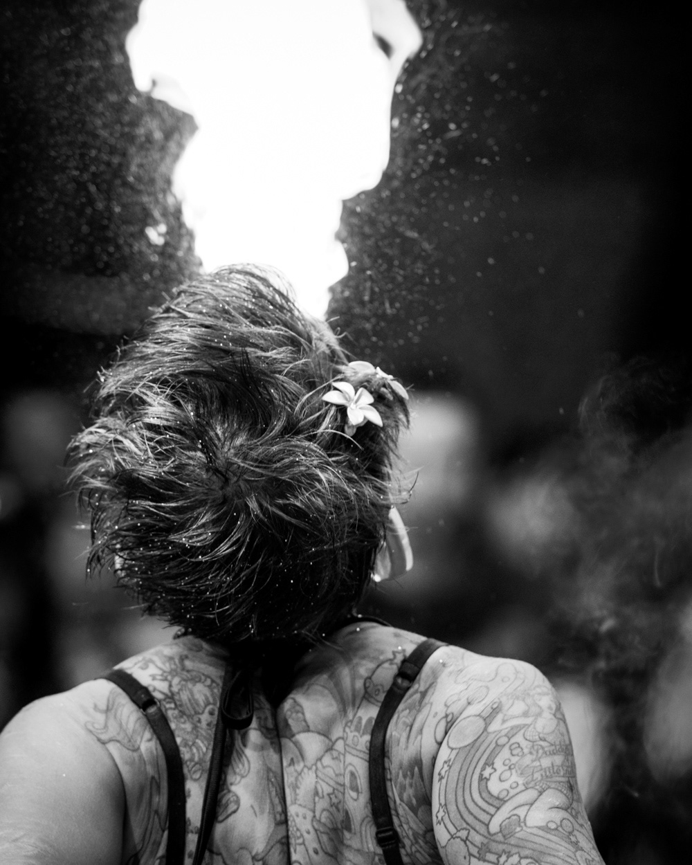 One of the Fuel Girls performing a fire-breathing act at the London Tattoo Convention. Image © Nik van Herpt