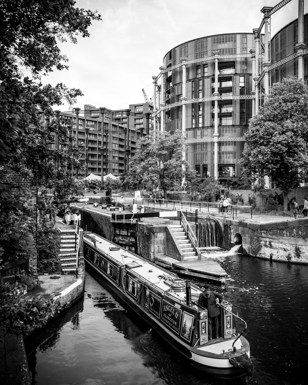 Angel II canal boat (Angel Community Canal Boat Trust) at St Pancras Lock, in front of Gasholders London. Image © Nik van Herpt