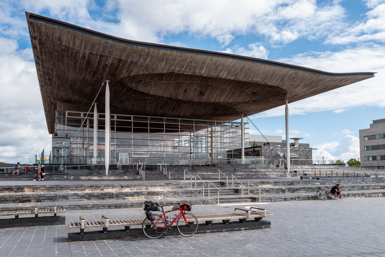 Bikepacking cycle outside Wales Millennium Centre. Image © Nik van Herpt
