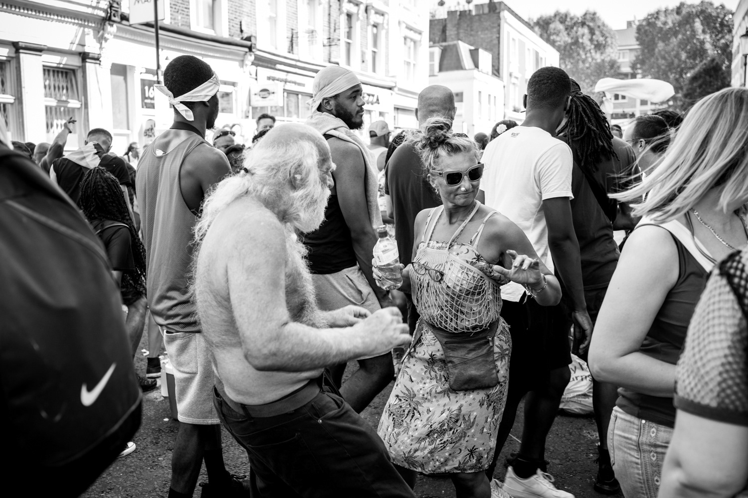 Older couple dancing at one of the carnival sound systems. Image © Nik van Herpt