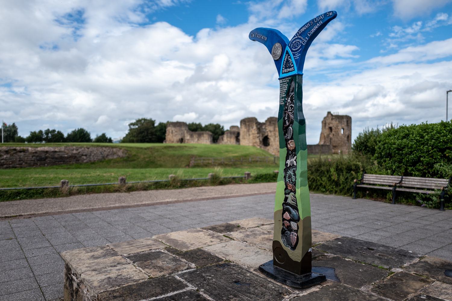 National Cycle Network (NCN) milepost outside Flint Castle, Wales. Image © Nik van Herpt