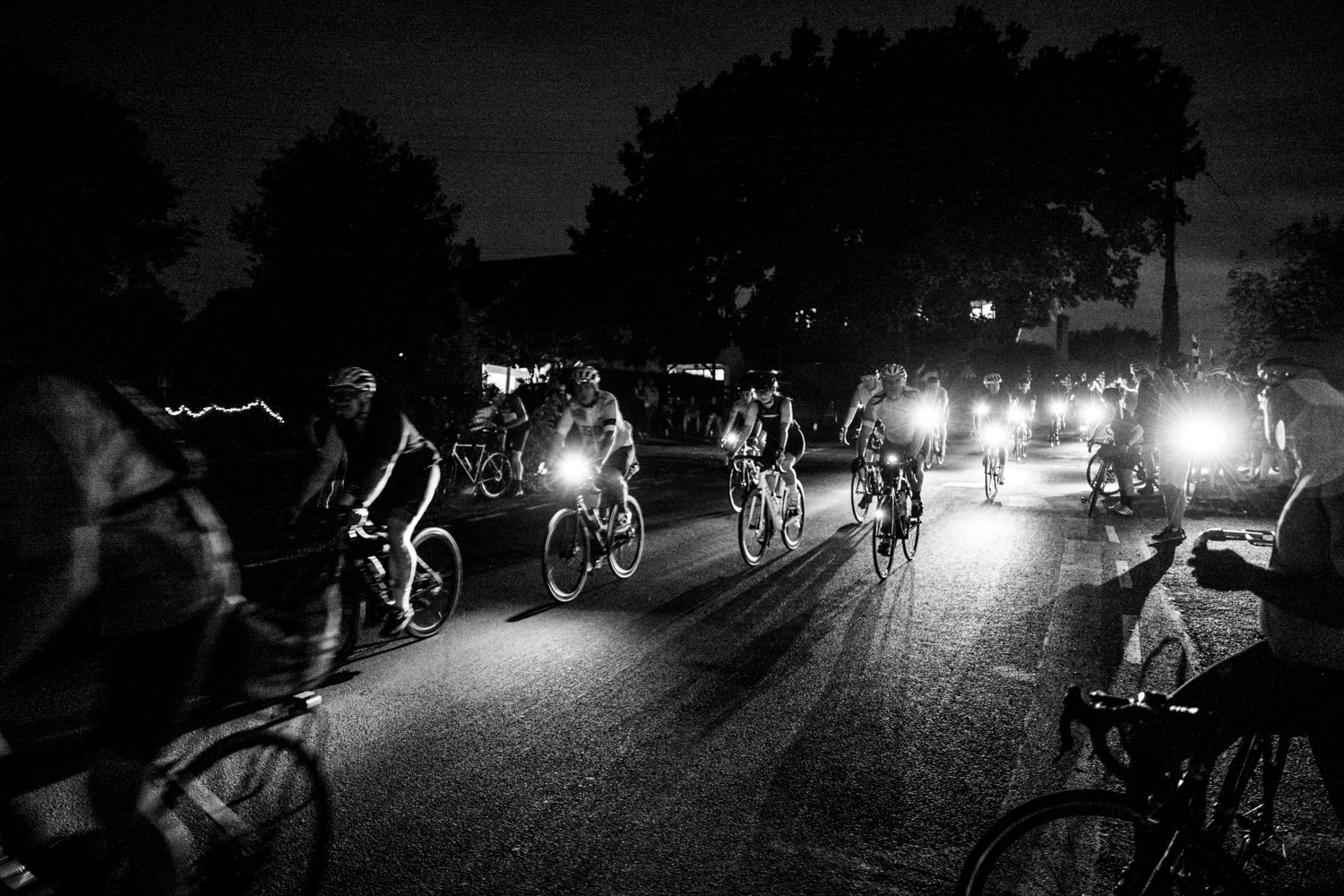 Bicycle lights shining on the road. Image © Nik van Herpt