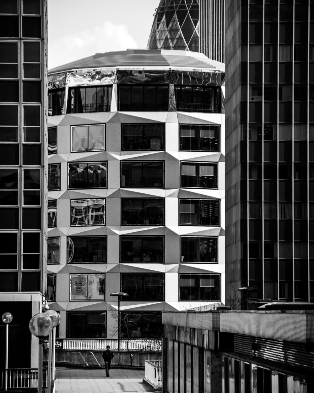 One Coleman Street seen between foreground buildings, before construction of London Wall Place obscured the view. Image © Nik van Herpt