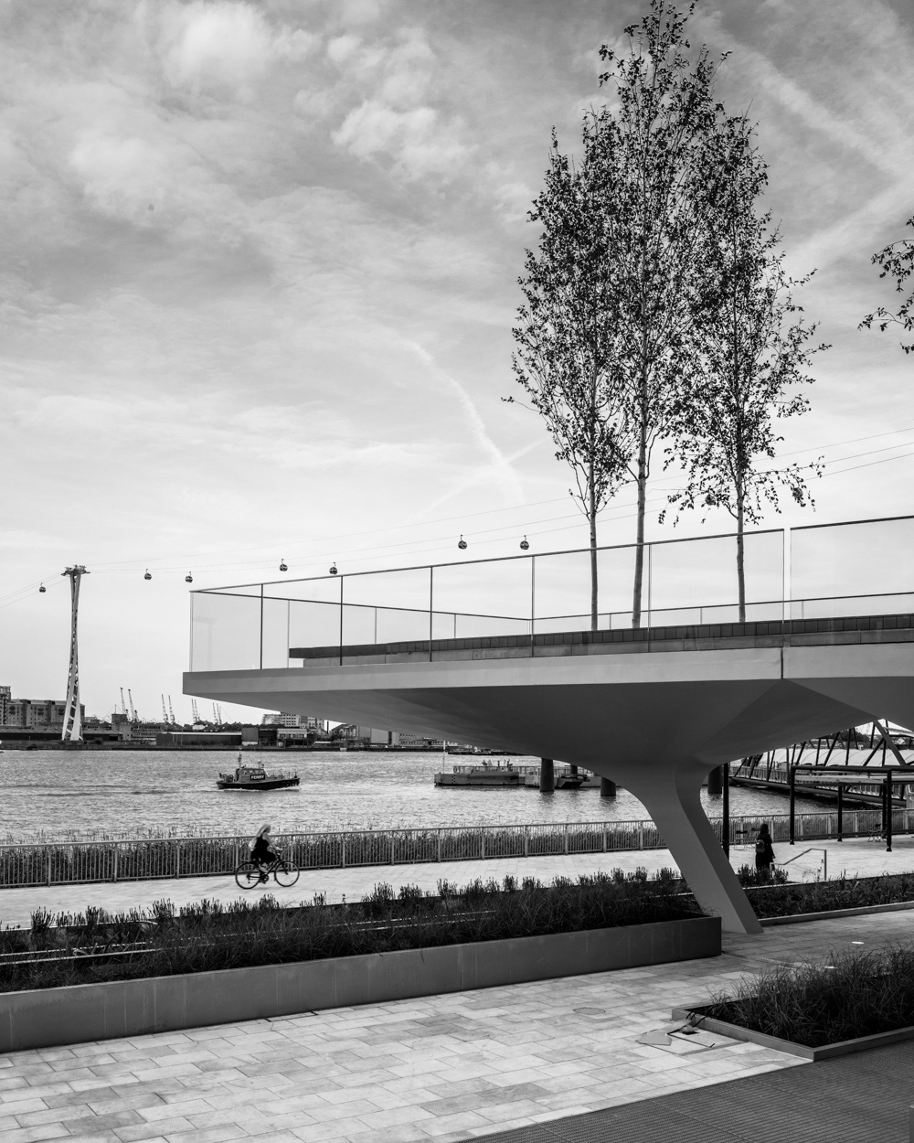 The Tide, looking out over the River Thames with the Emirates Air Line cable car in the distance. Image © Nik van Herpt