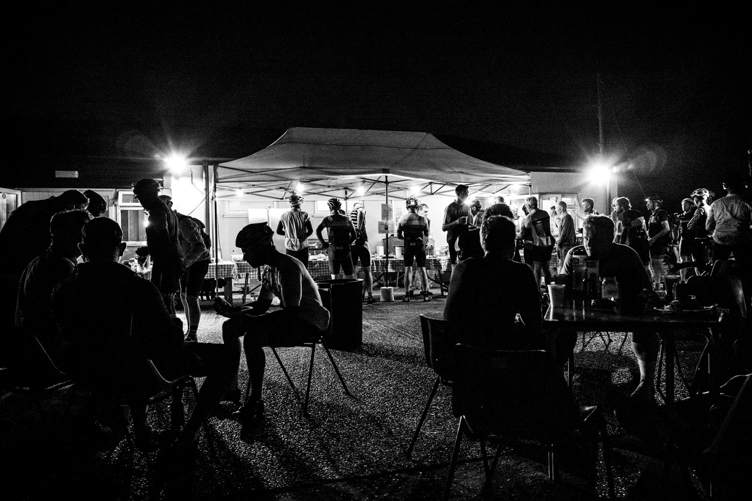 Riders outside a pop-up stop tent. Image © Nik van Herpt
