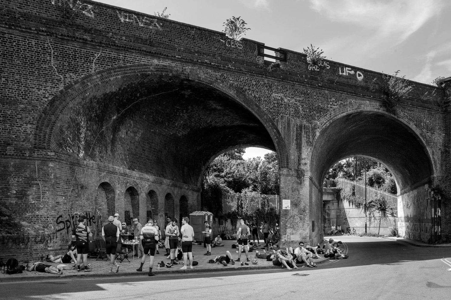 Waiting underneath railway arches for the bicycles to arrive. Image © Nik van Herpt