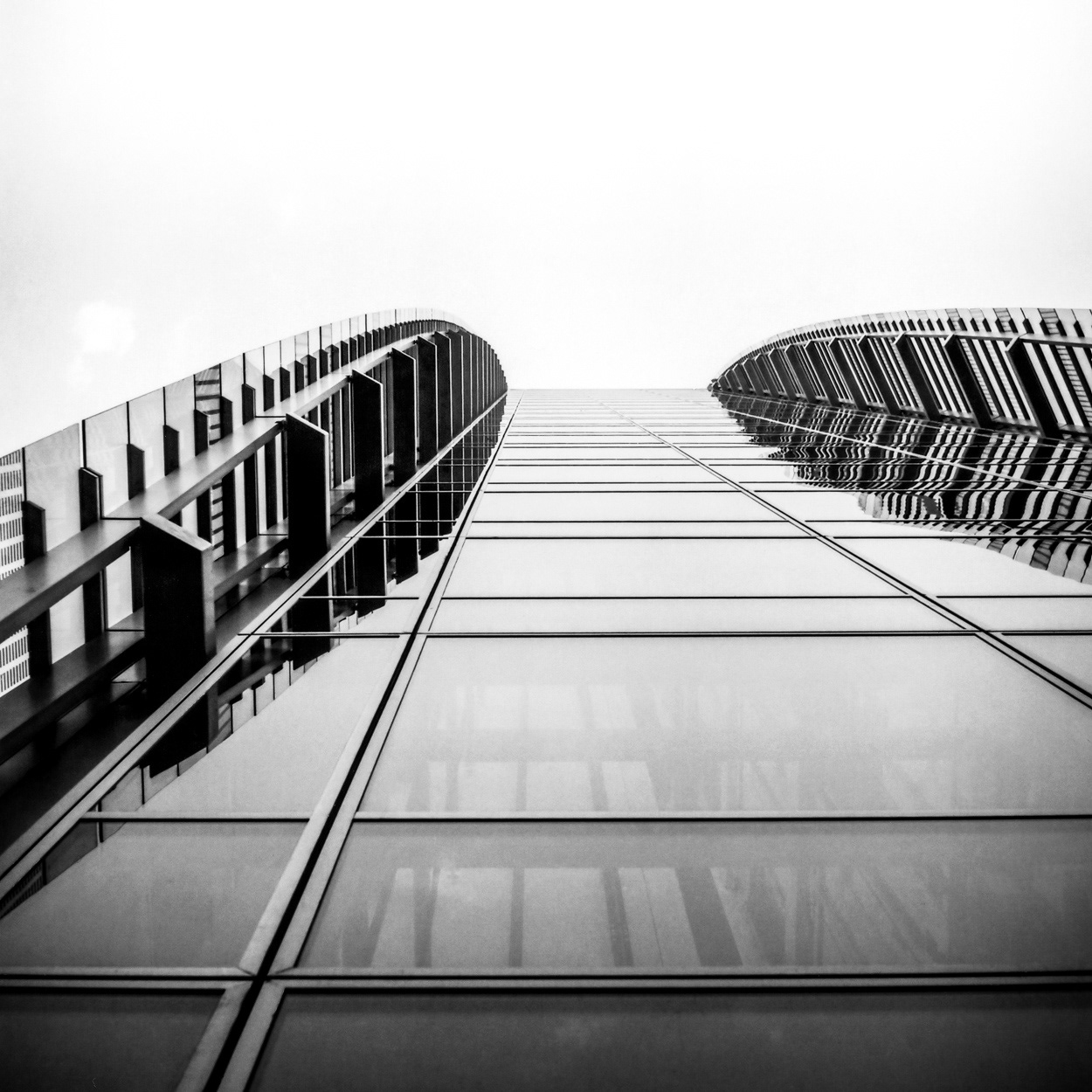 Looking up at the exterior of 30 Crown Place. Image © Nik van Herpt