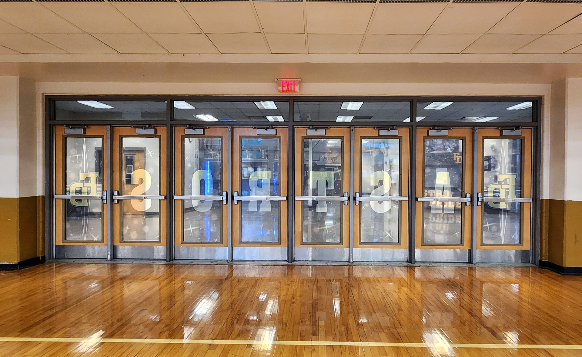 window perf over eight doors reading 'FDHS' in yellow with a grey background. On the doors window perf reading 'FD Astros FD' in yellow on a grey background