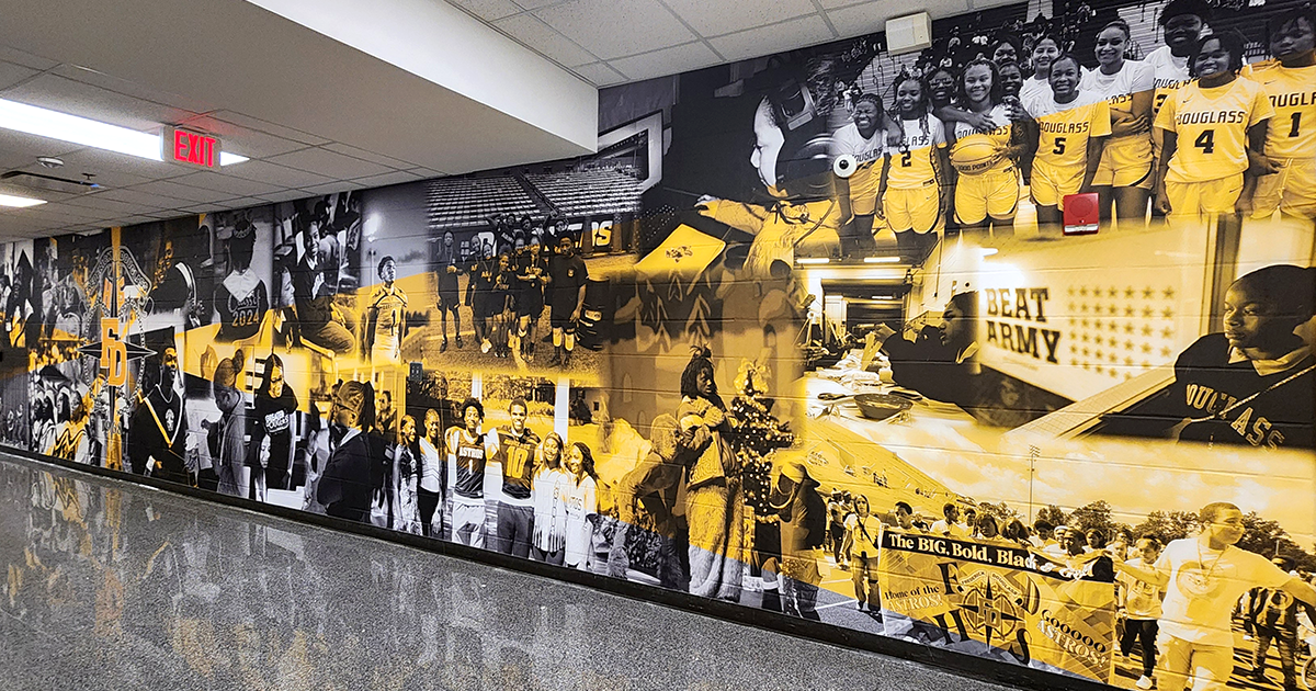 full print adhesive wall mural featuring a black and white collage of students accented with yellow