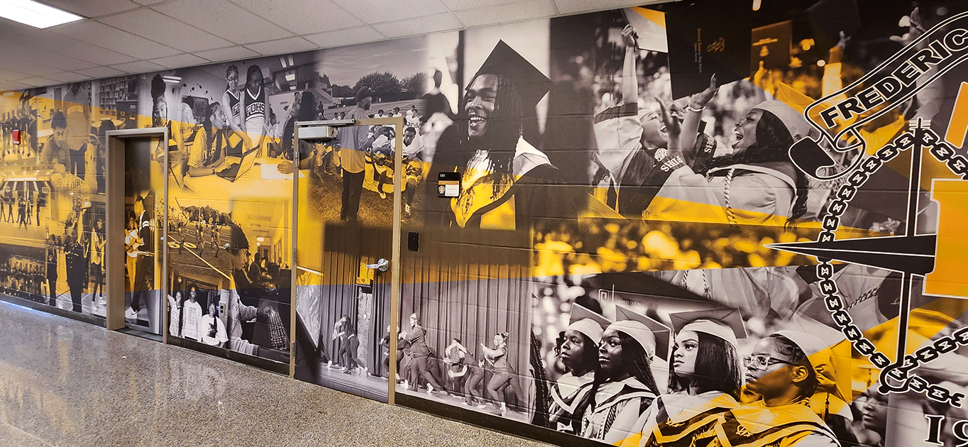 full print adhesive wall mural featuring a black and white collage of students accented with yellow