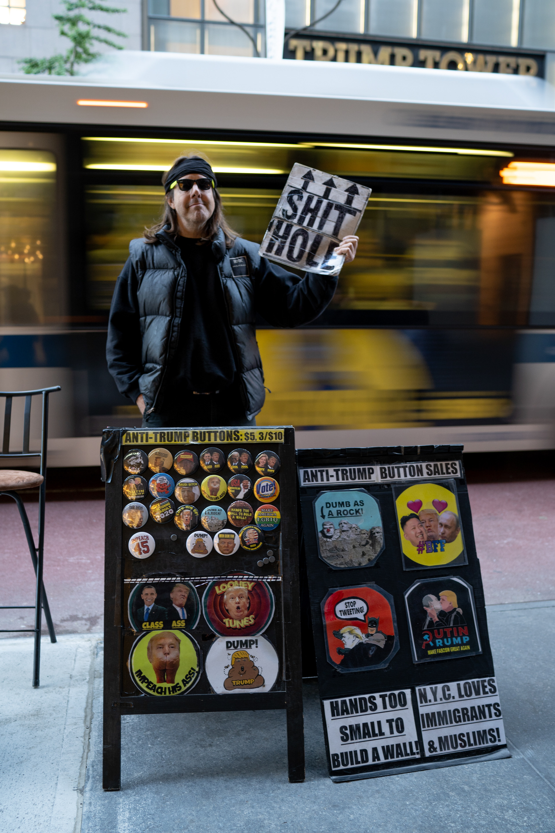 OUTNOW Protest, Midtown NYC, October 19th, 2019 — Paul, an anti-Trump button salesman across the street from Trump Tower.