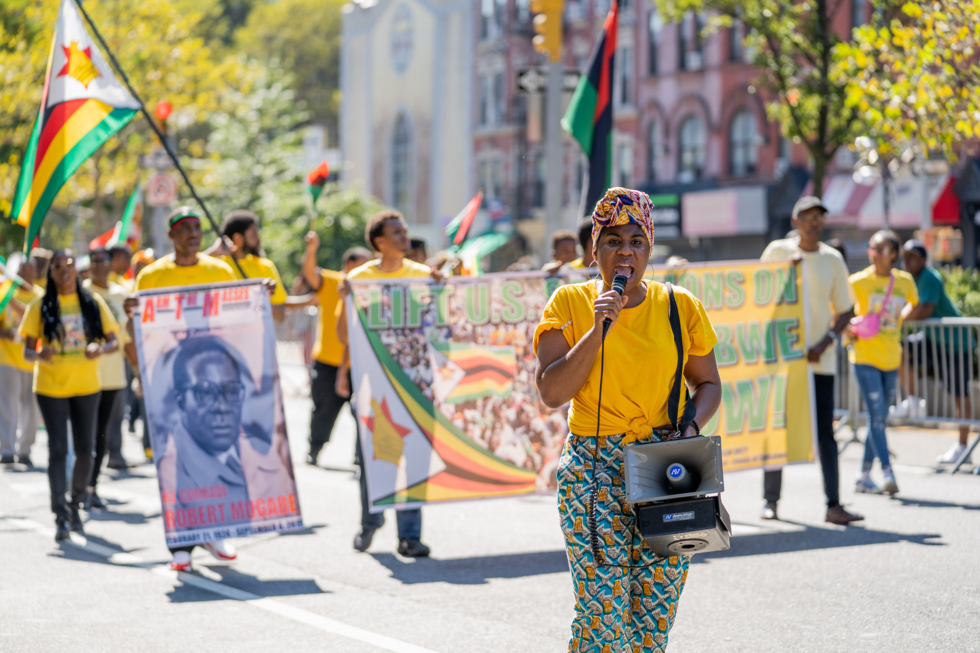 Harlem, New York — September 15, 2019. African American Day Parade; Friends of Zimbabwe protest U.S. sanctions on Zimbabwe.