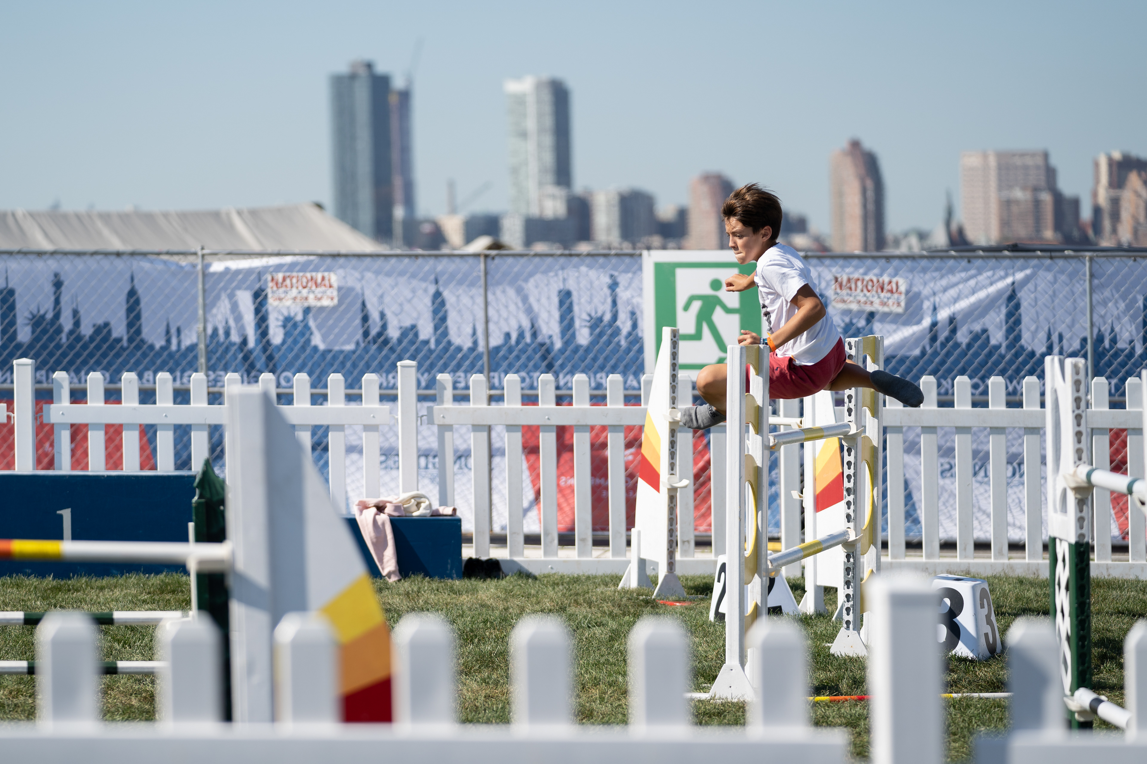 Governer’s Island, New York — September 27, 2019. The league sets up a play zone for kids to jump over hurdles.