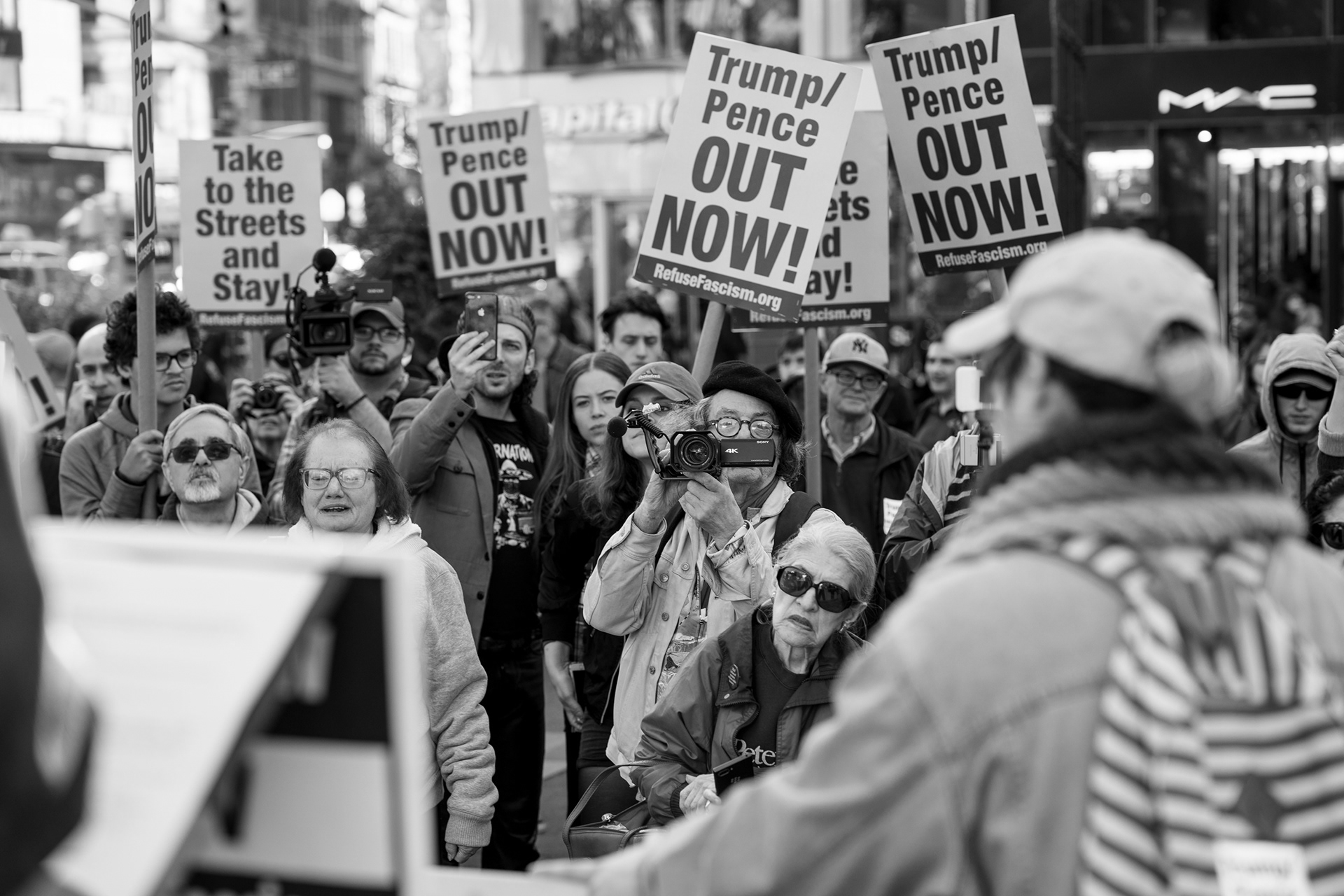 OUTNOW Protest, Union Square Park, October 19th, 2019 — Protesters listen to activist Andy Zee.