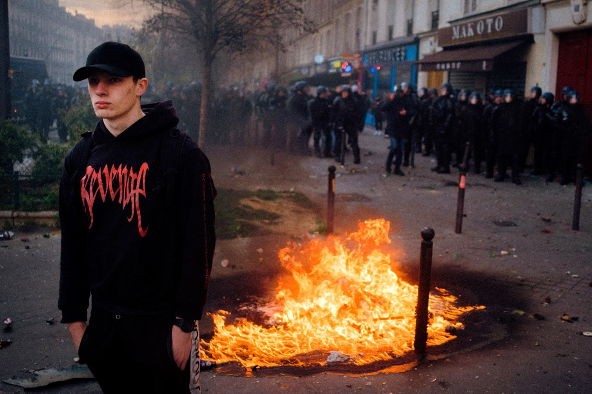 'Revenge'. Riot against Macron's parliament-bypassed pension reforms, Paris, 2023