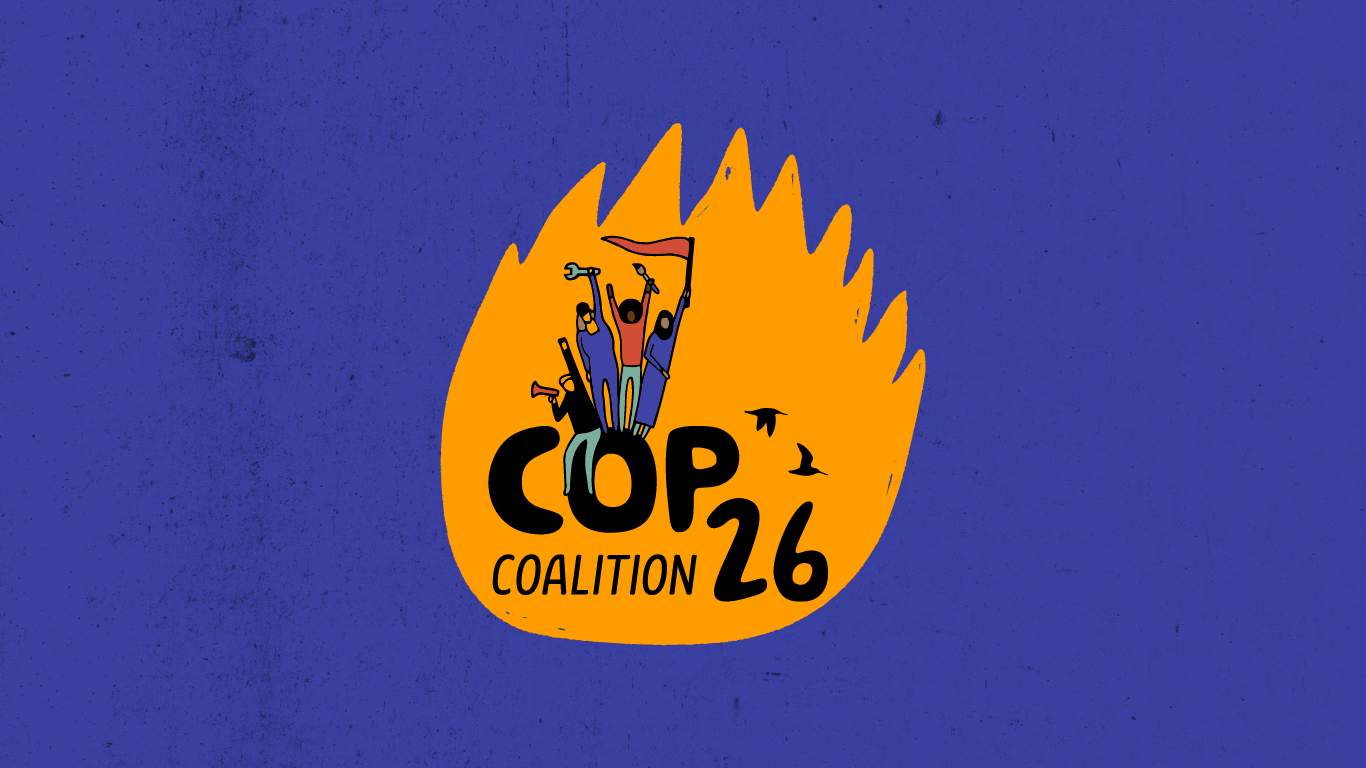 Same logo as above but on a mustard coloured flame shape, on a blue background