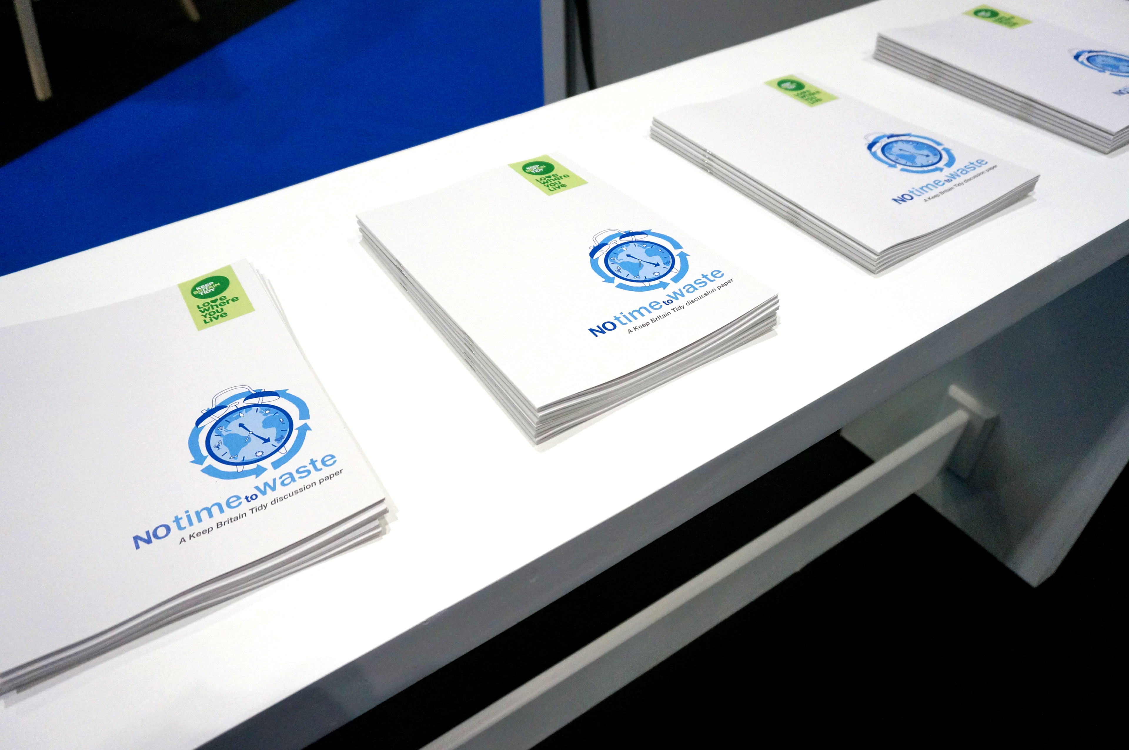 No time to waste stacks of reports on table