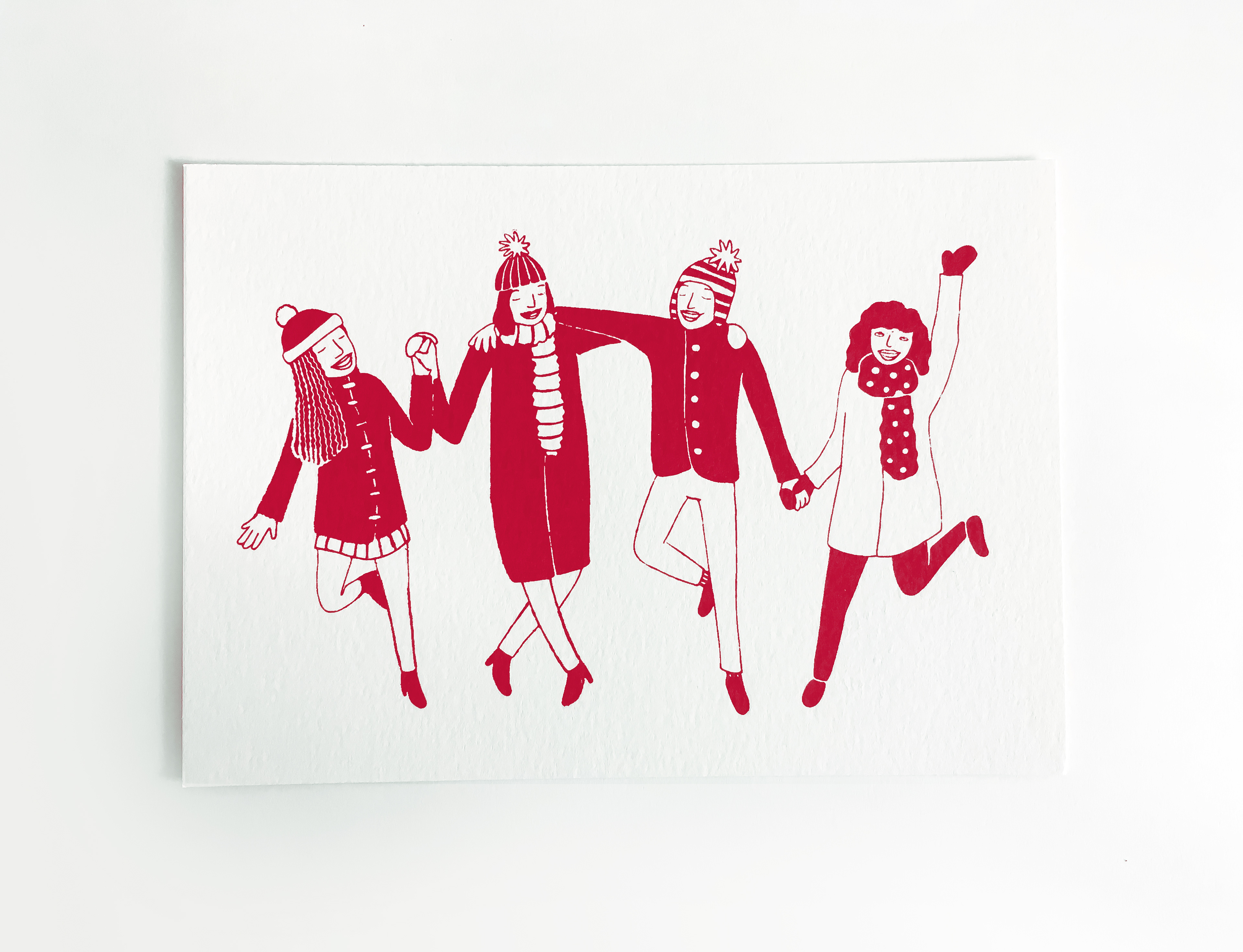 Screen printed card - four people wearing winter clothes and dancing