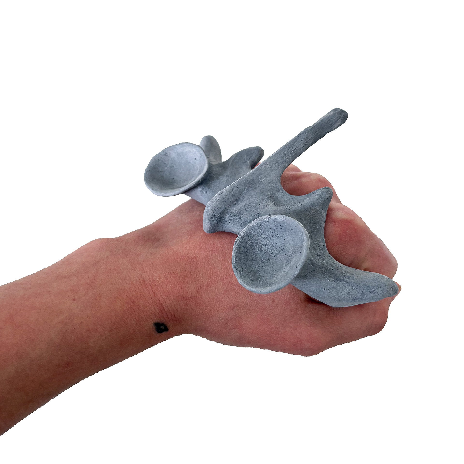 Vertebra 'knuckleduster', black porcelain, 2025 (unfired)