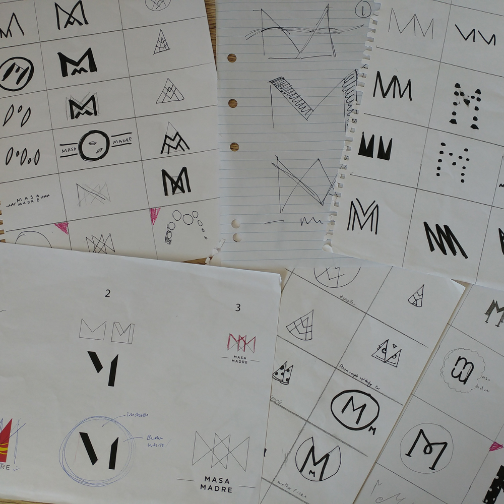 Sketching and ideation for logo before going to the computer