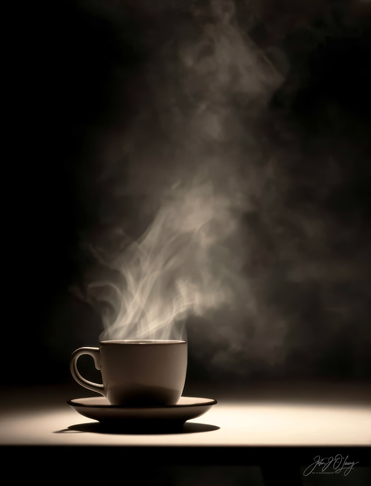 CUP OF STEAMING COFFEE