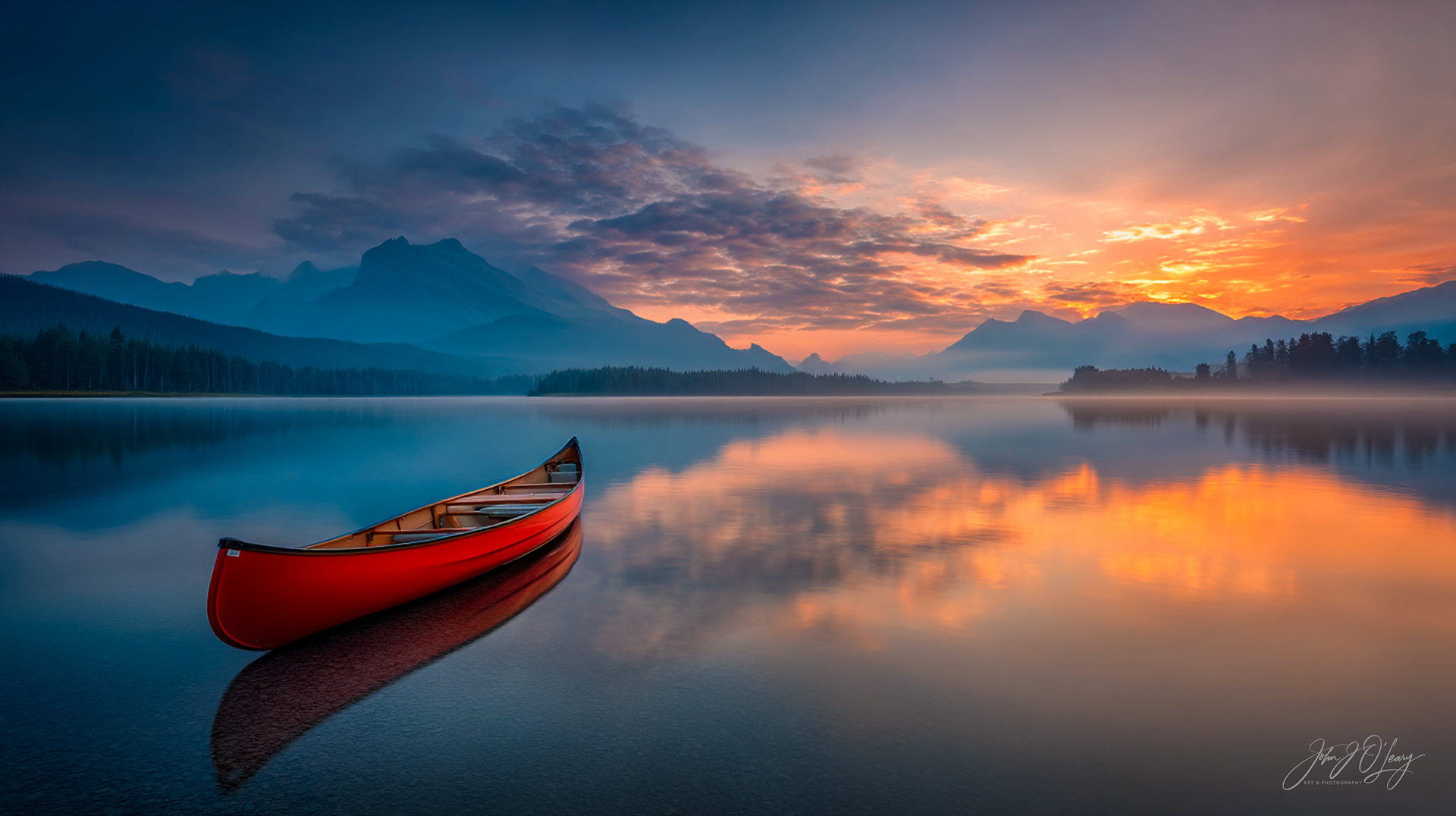 RED CANOE AT SUNSET