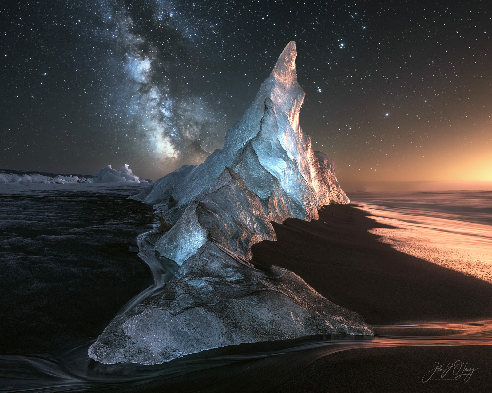 ICEBERGS ON BLACK SAND BEACH