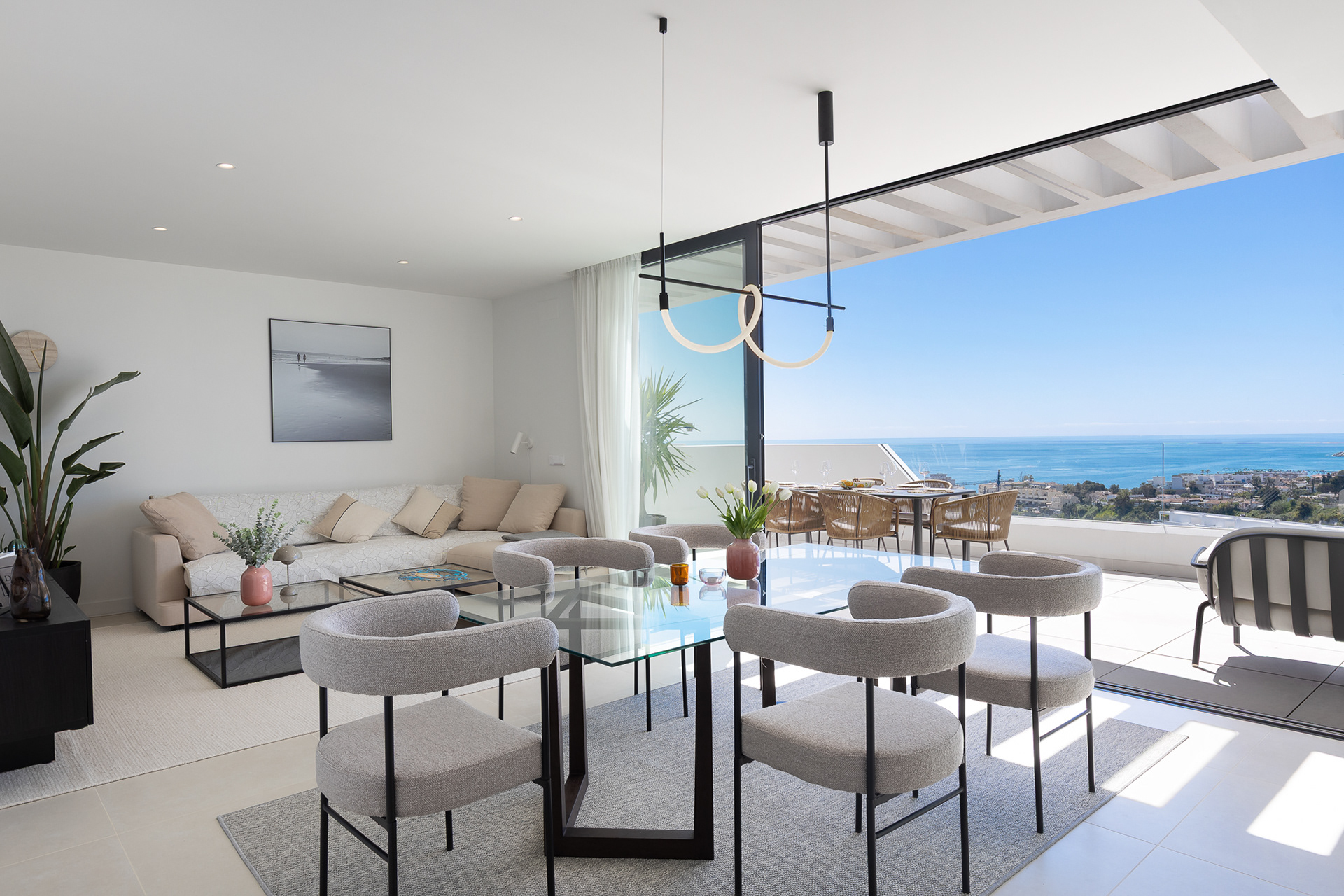 Luxury sea view apartment in Higuerón Fuengirola with open-plan living and terrace, styled for real estate marketing on the Costa del Sol.