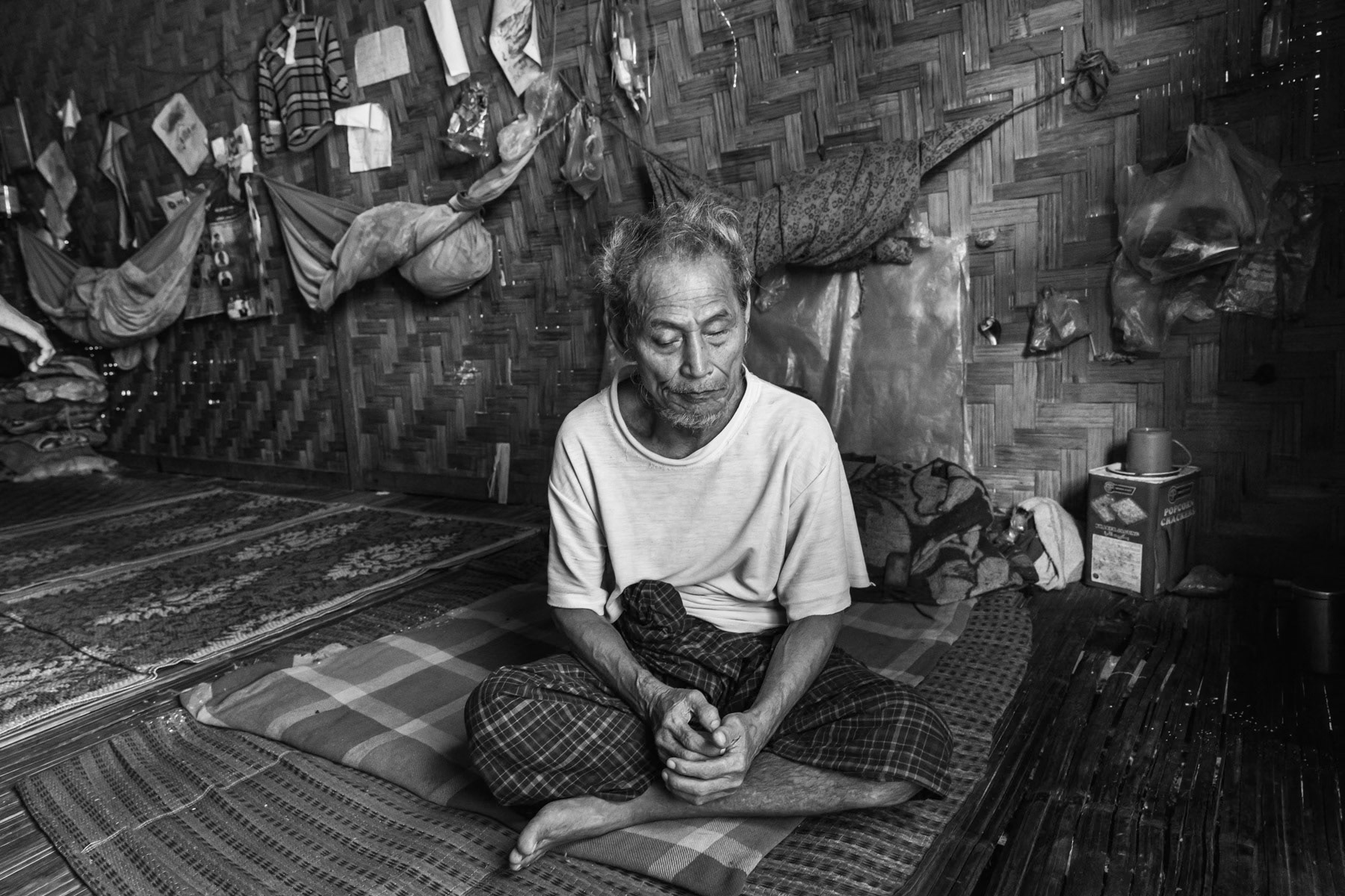 An elder and blind internal displaced person living in a camp for Kachin IDP in Mogaung. Mahong IDP camp, Kachin, Myanmar, September 2019