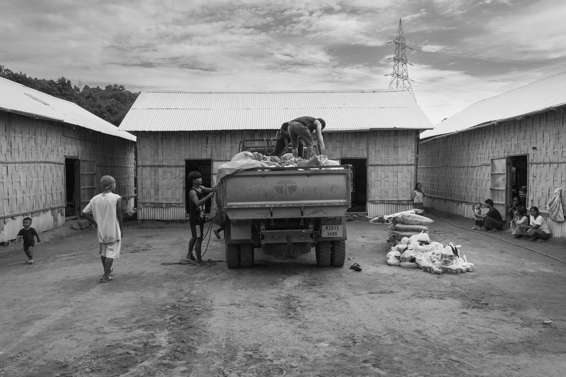 Food distribution for vulnerable Chin refugees who have arrived recently from Myanmar. Refugee camp,in Mizoram, India, October 2022