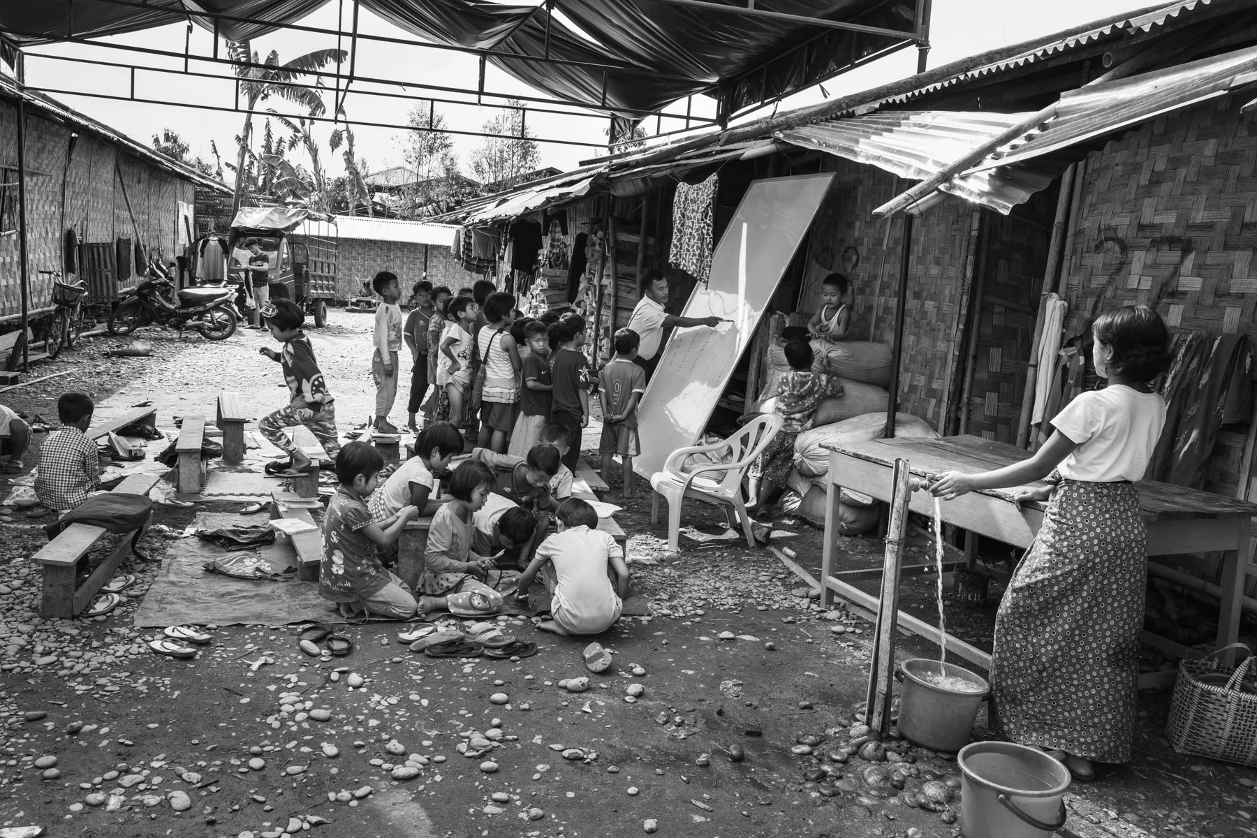 Improvised classroom in a camp for Kachin internally displaced persons. Over 100,000 Kachin have been living in 130 camps spread accross govrnment and Kachin Independence Army controlled territory. Waingmaw IDP camp in government controlled Waingmaw township, Burma, March 2019