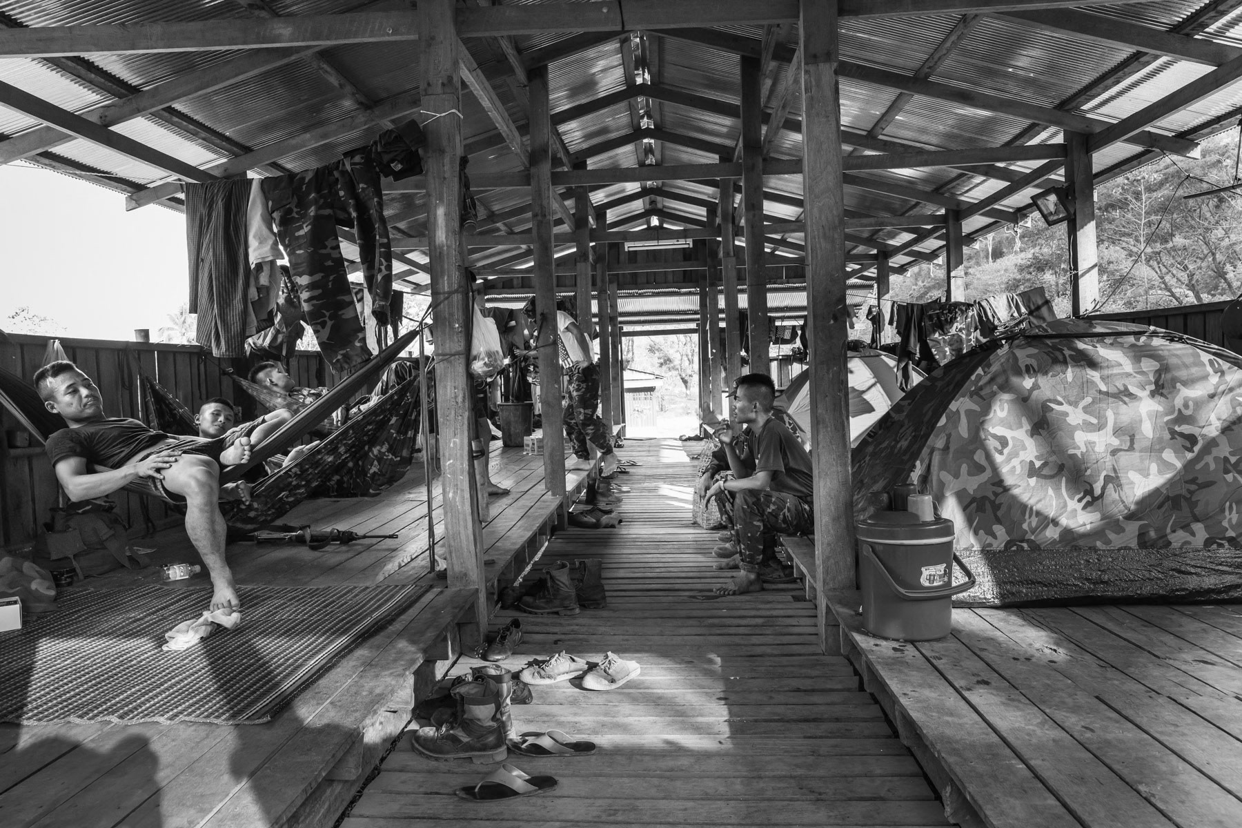Karen National Defense Organisation Soldiers resting in their barracks. Kayin State, Myanmar, March 2019