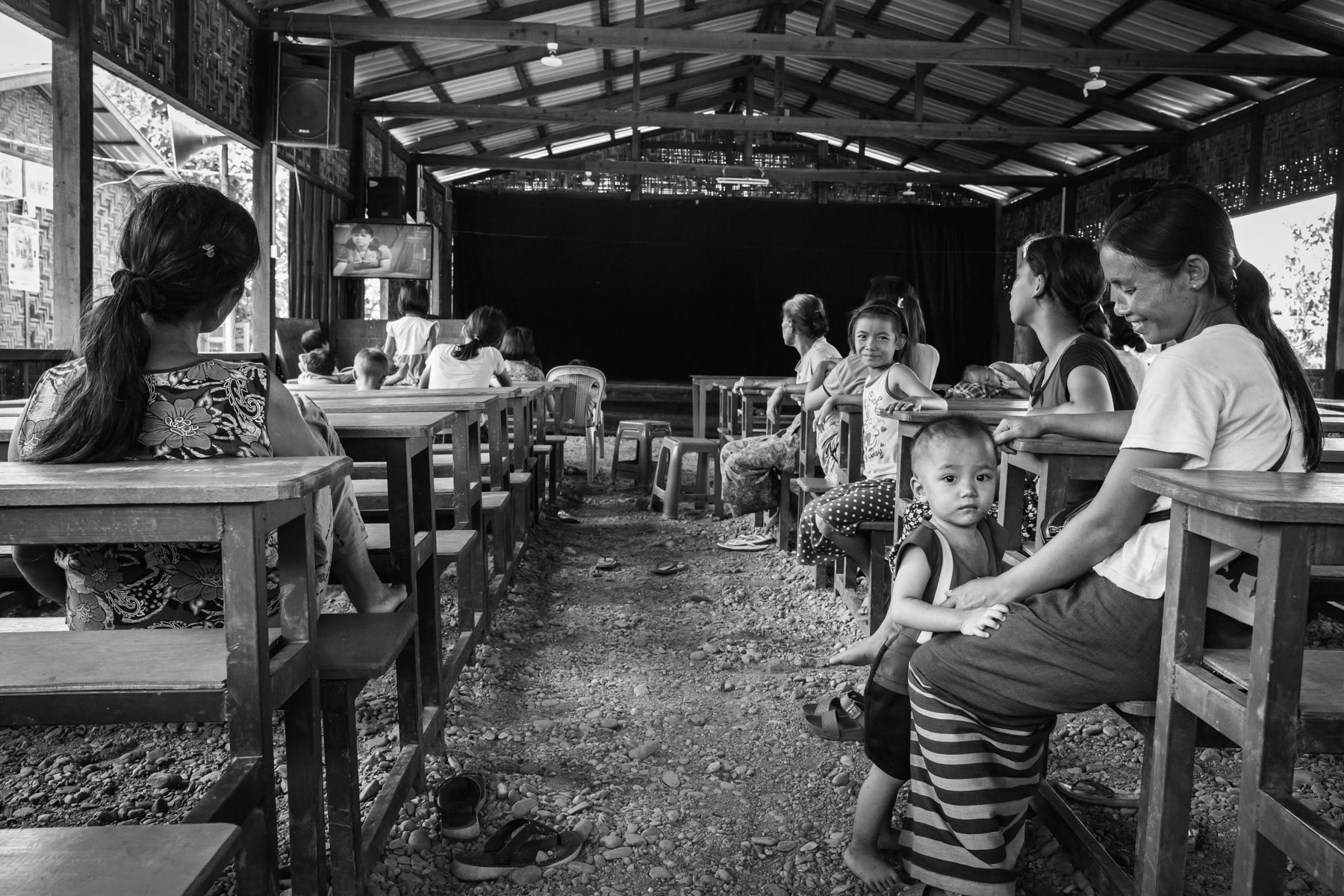 Social and public area in Lambraw IDP camp where 557 people live since April 2018 after being displaced from their village 25 Km away. Namta, Kachin, Myanmar, September 2019
